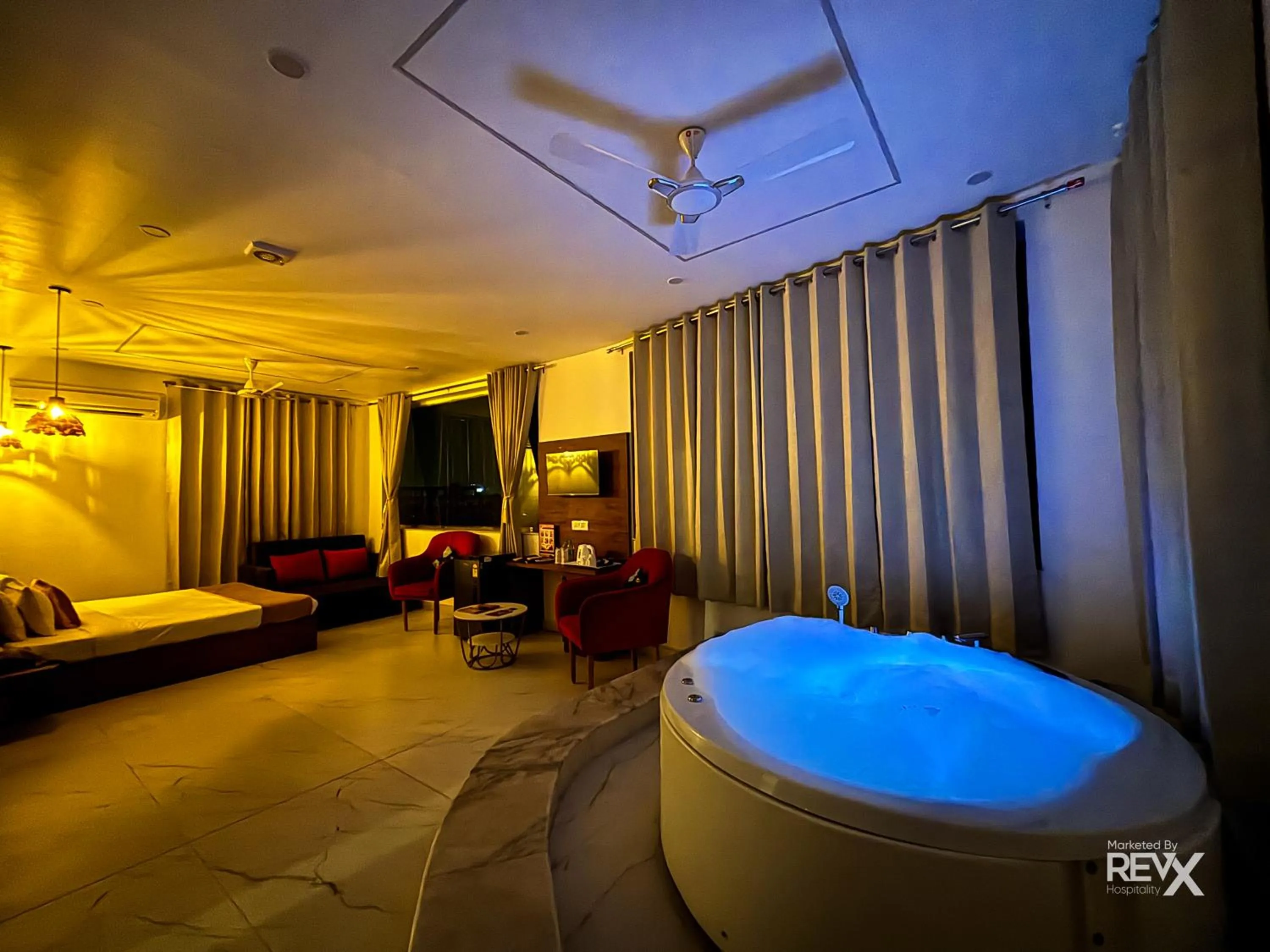 Bed in The Neeraj River Forest Resort Ayurvedic Wellness Center