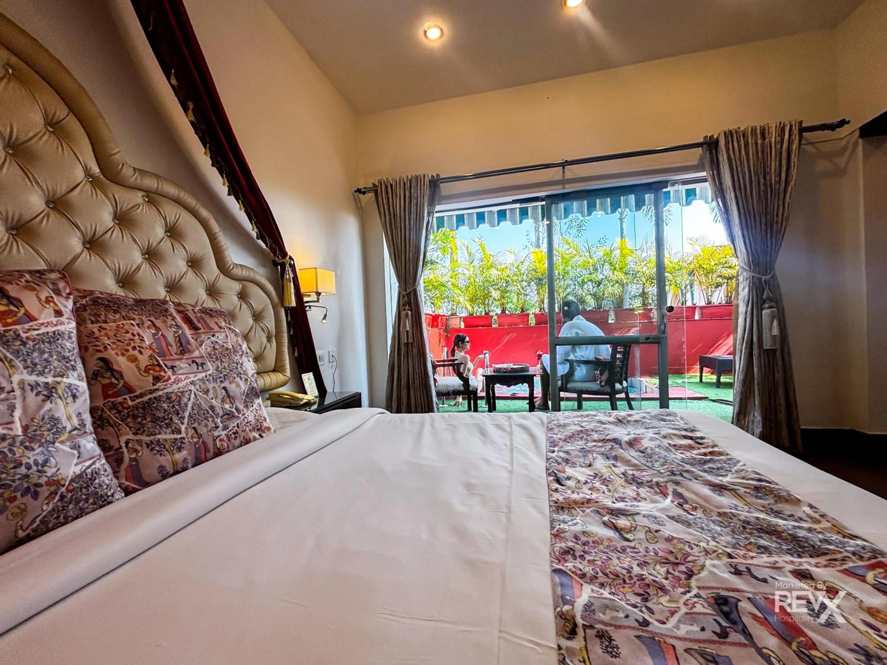 Bed in The Neeraj River Forest Resort Ayurvedic Wellness Center