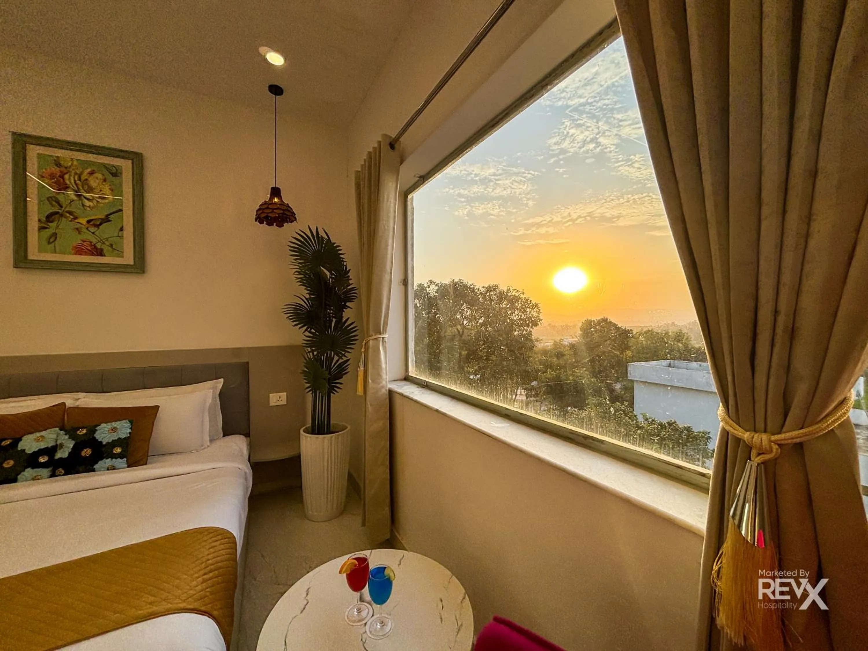 Bed in The Neeraj River Forest Resort Ayurvedic Wellness Center