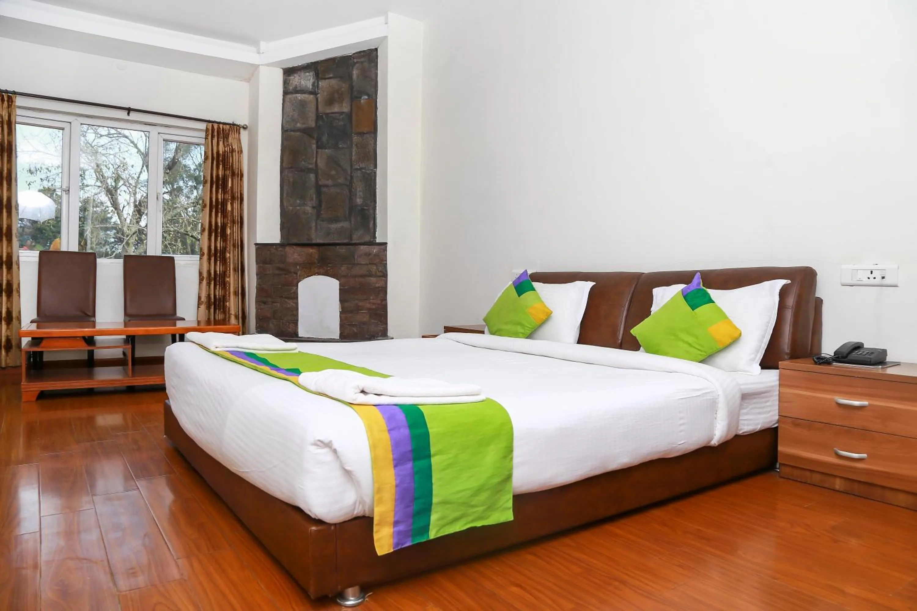 Bed in Yantra Resort, Ooty