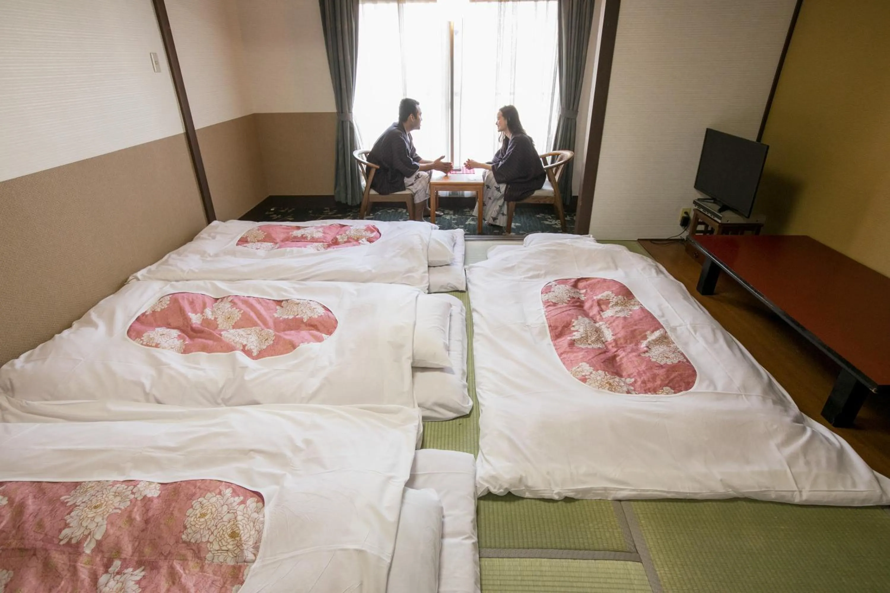 Photo of the whole room, Bed in Hotel New Tsuruta