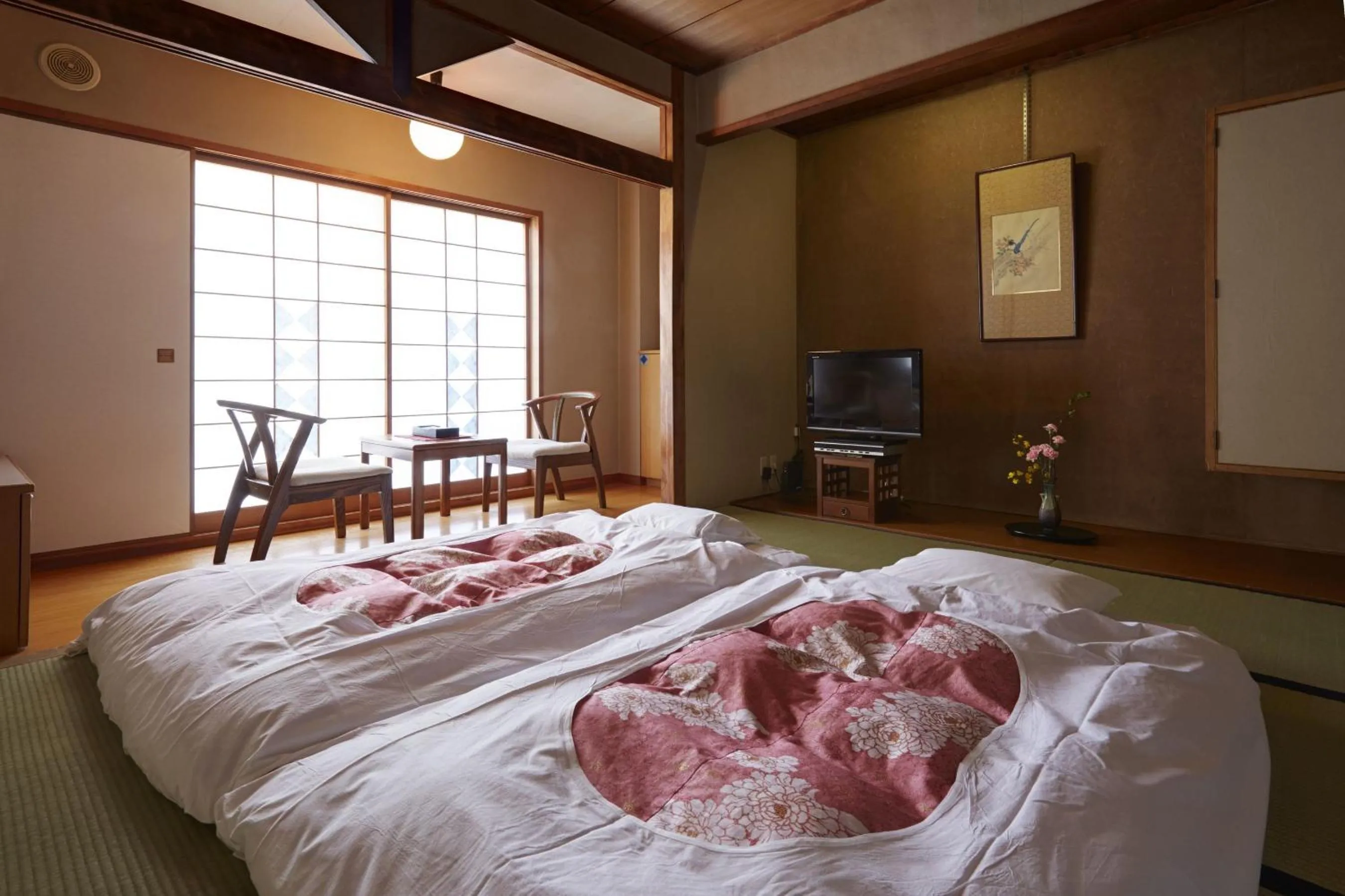 Bed in Hotel New Tsuruta