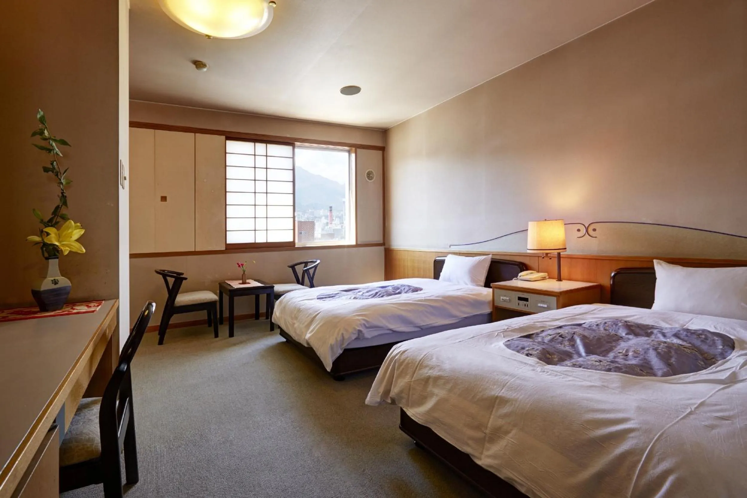 Photo of the whole room, Bed in Hotel New Tsuruta