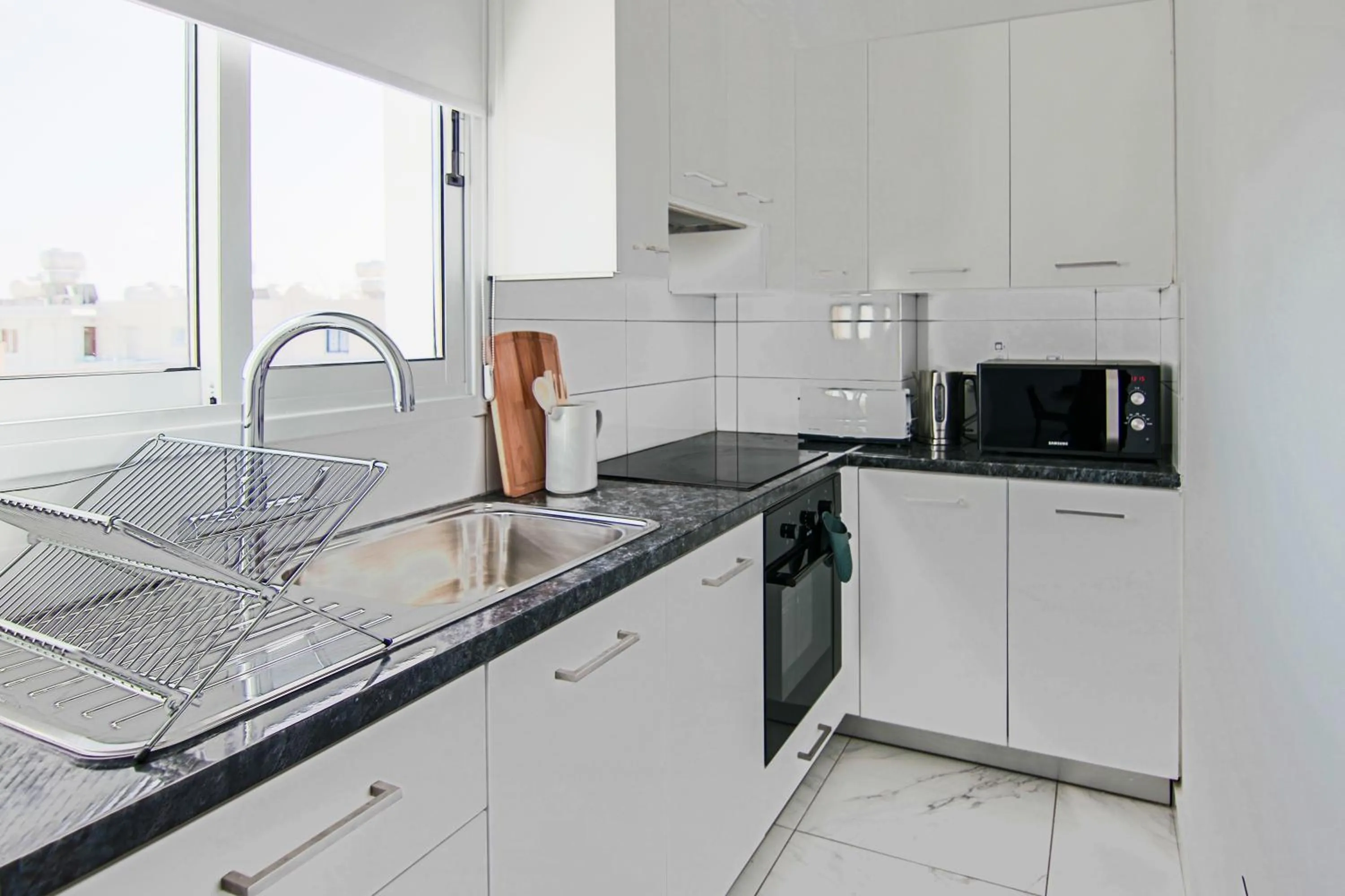 Kitchen or kitchenette in Phaedrus Living - Seaside Executive Flat Harbour 206