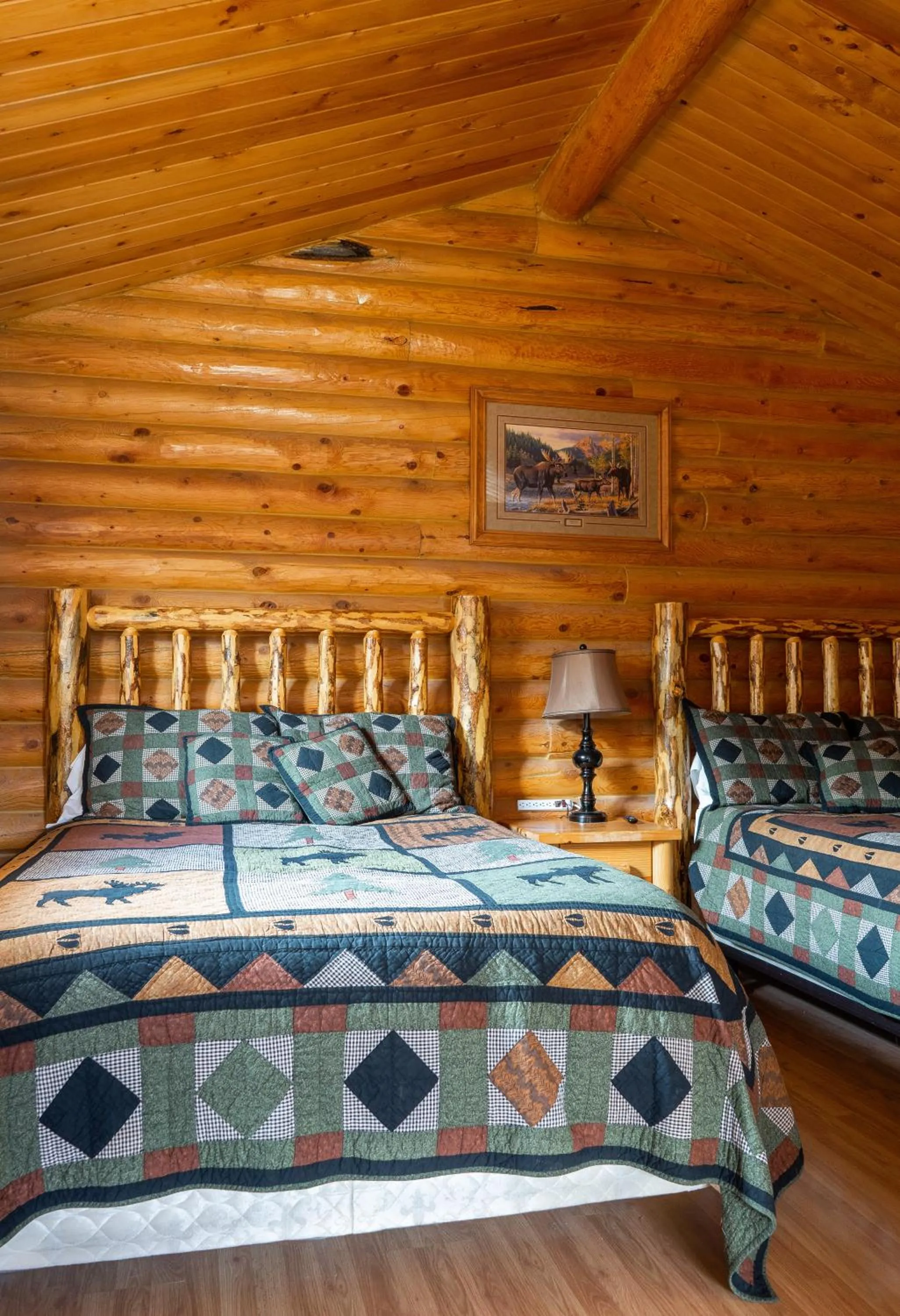 Bed in Country Cabins Inn