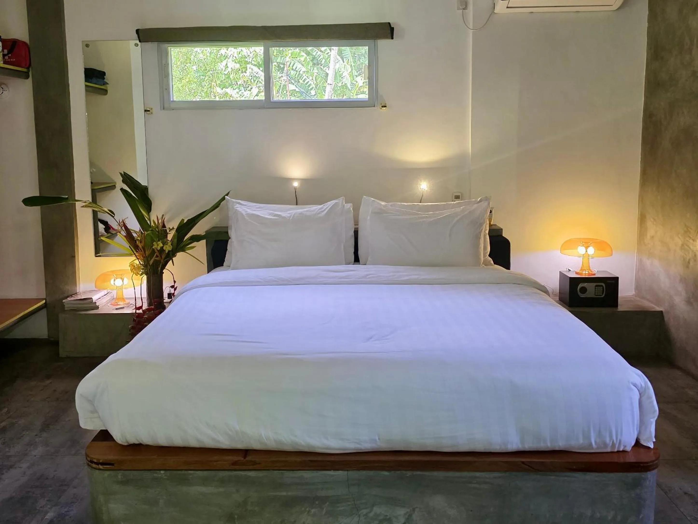 Bed in SomeWhere Else Boutique Resort