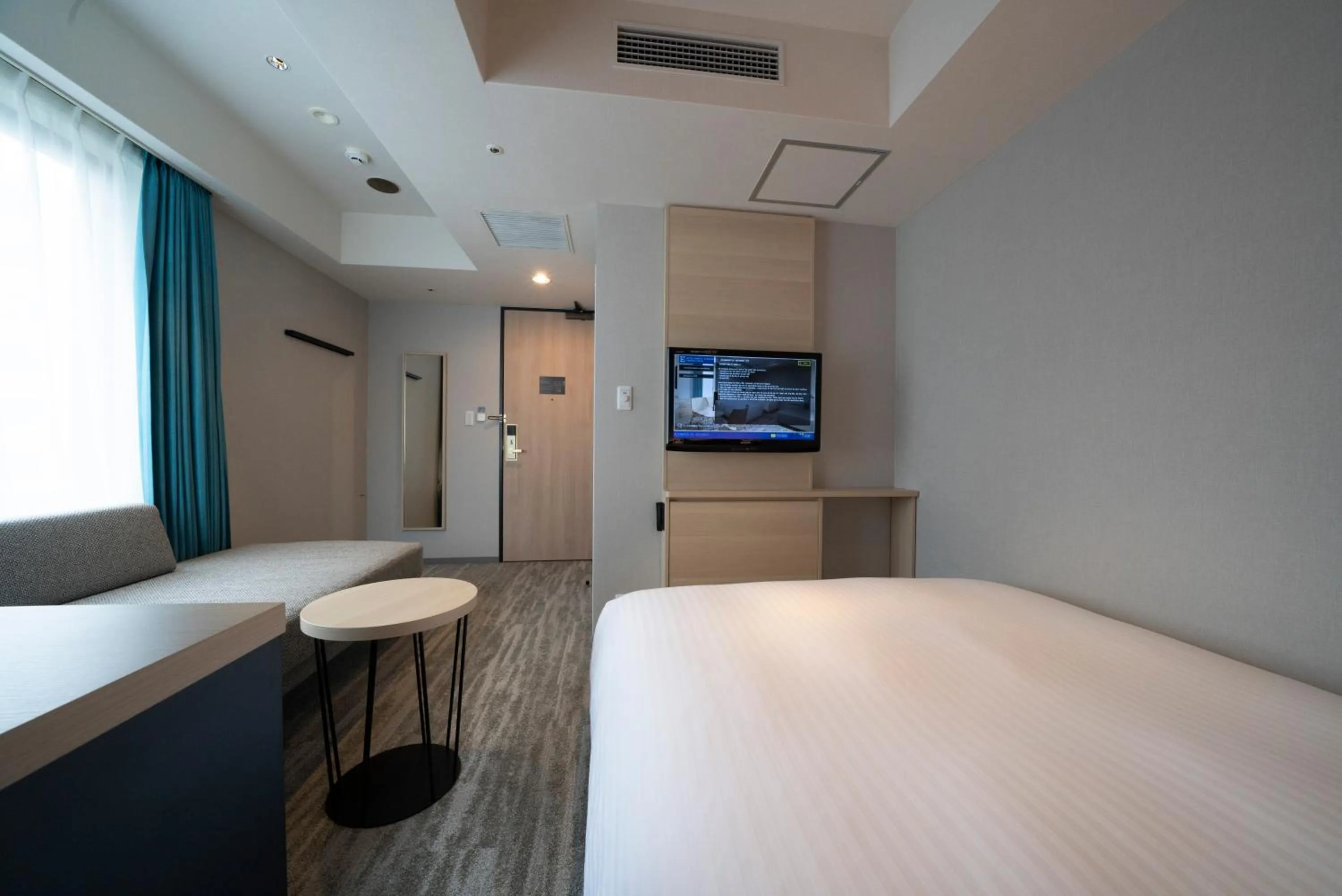 Photo of the whole room, Bed in Hotel Oriental Express Fukuoka Tenjin