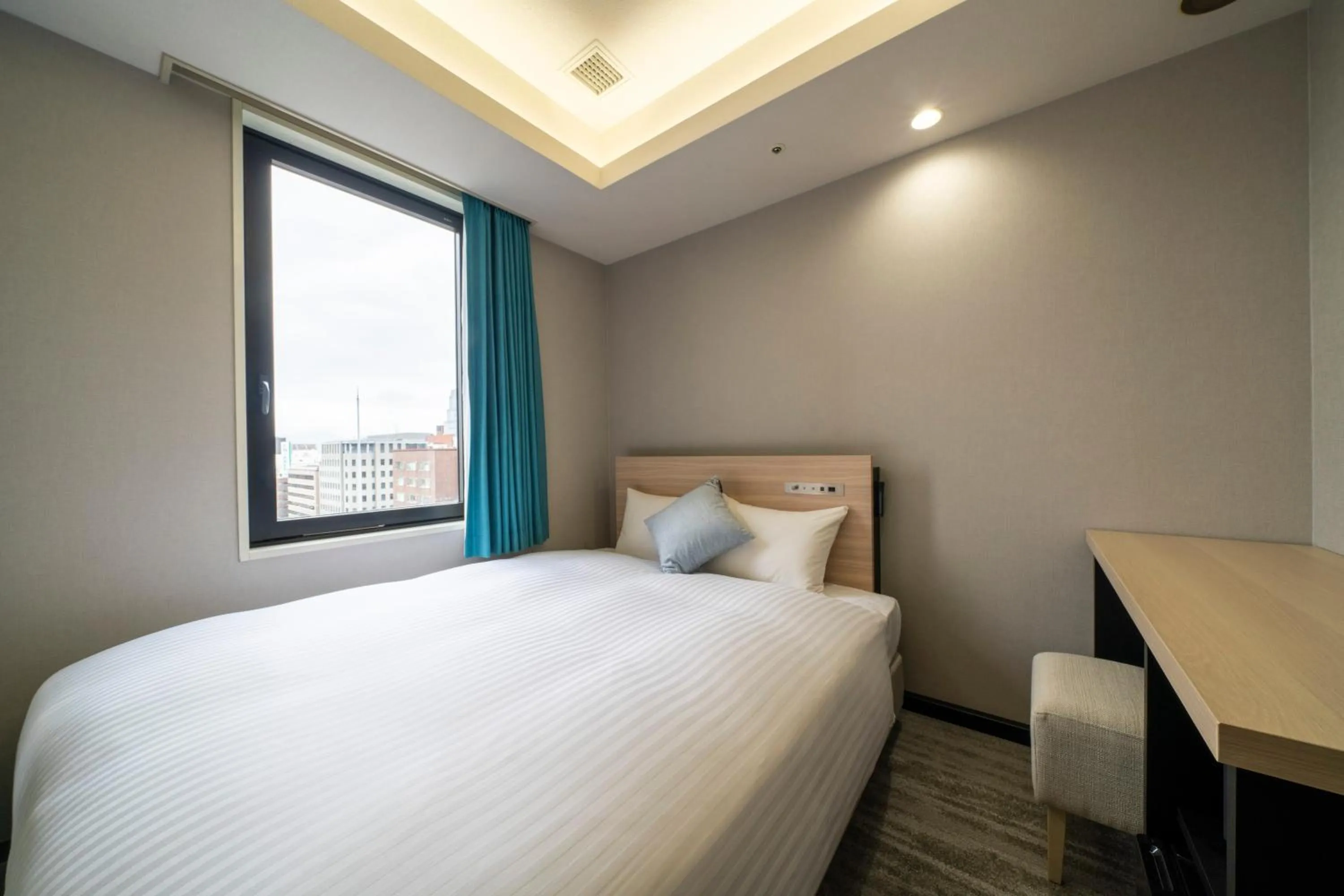 Photo of the whole room, Bed in Hotel Oriental Express Fukuoka Tenjin