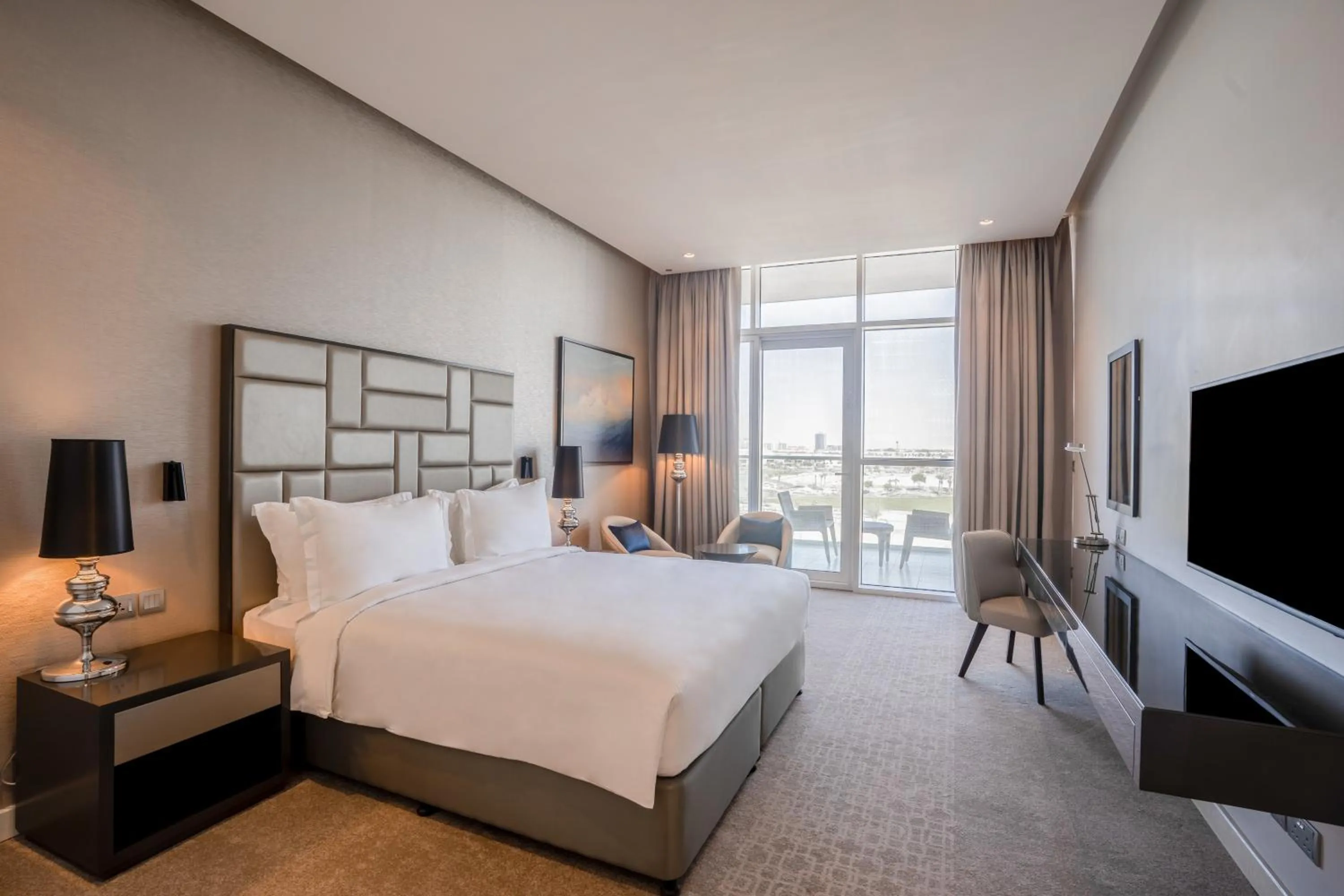 Bedroom, Bed in Radisson Dubai Damac Hills