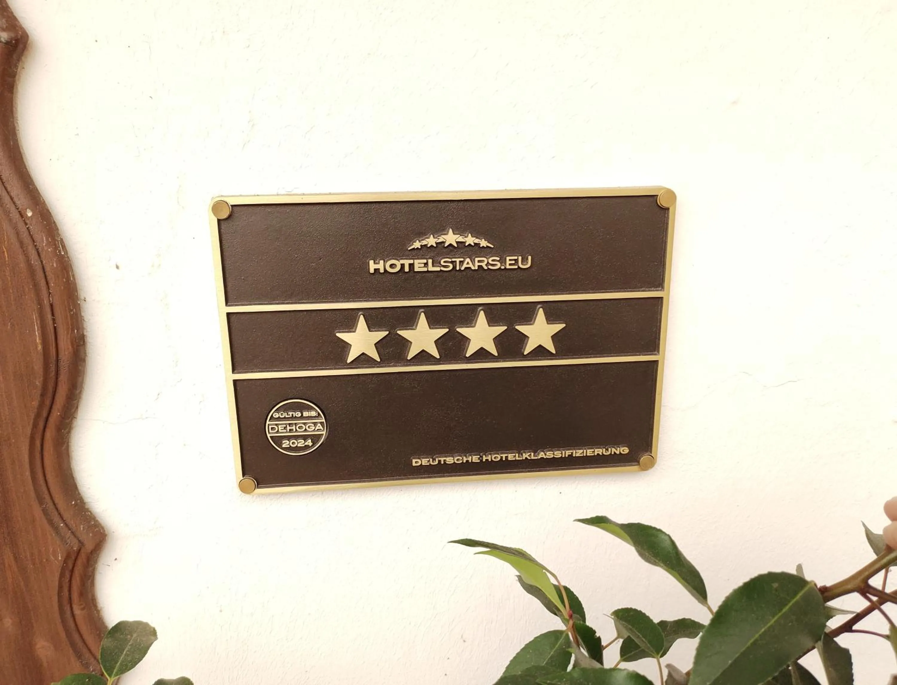 Property logo or sign in Hotel Weinhof Groß Mackenstedt