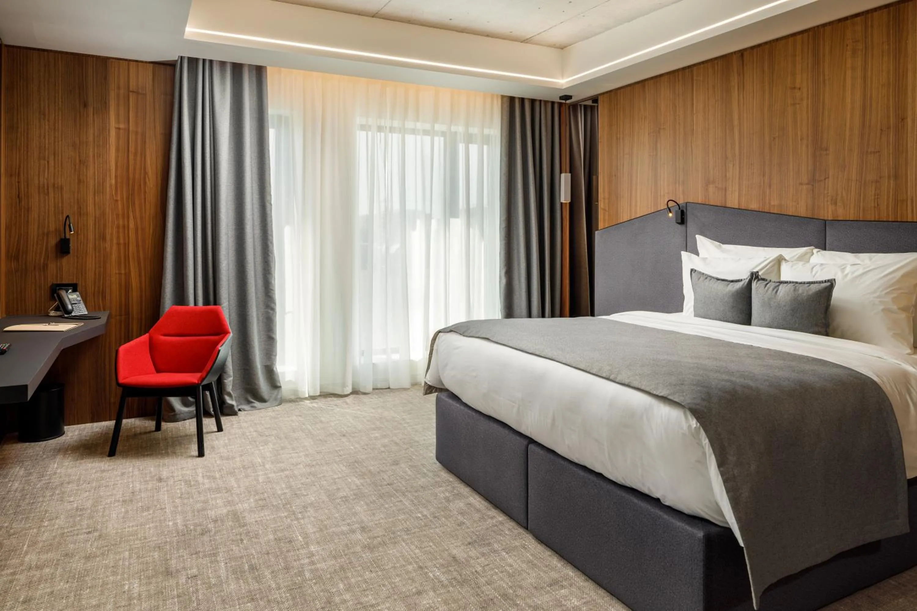 Bed in Qosmo Brasov Hotel