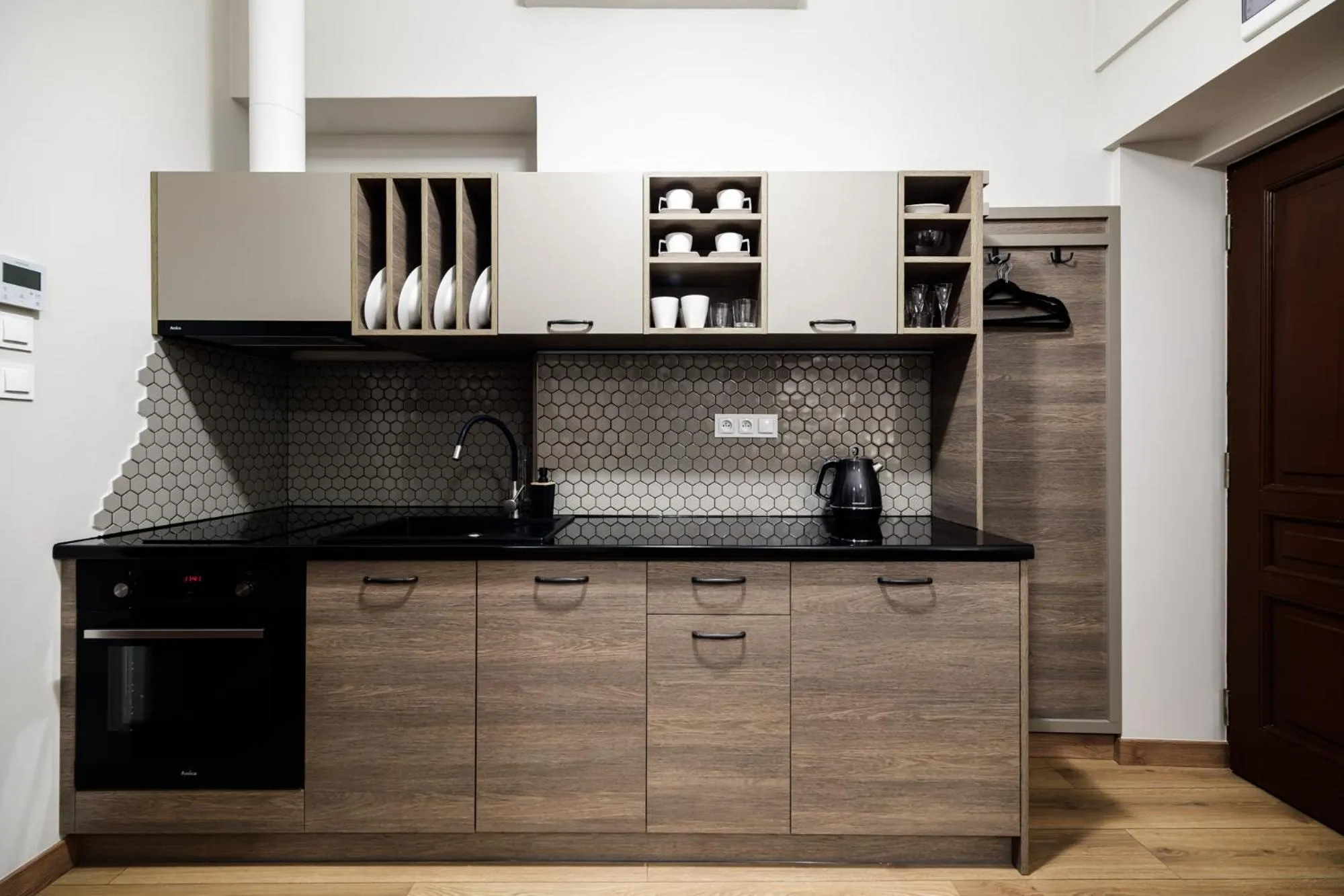 Kitchen or kitchenette in Apart Residence Ariańska 16 by NEARTO PL