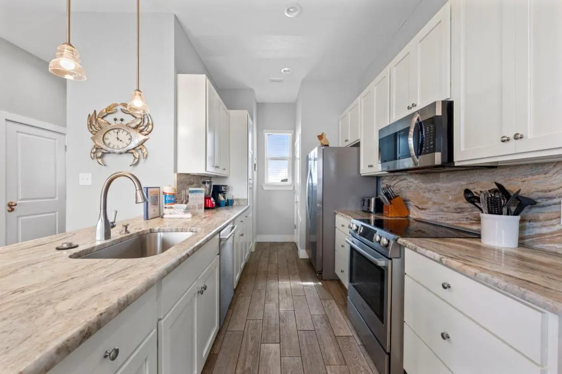 Kitchen or kitchenette in Two Little Lambs at Our Point of View by Youngs Suncoast