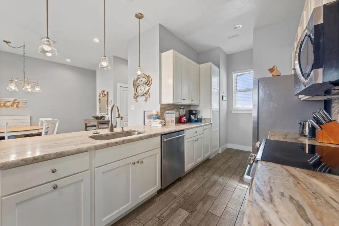 Kitchen or kitchenette in Two Little Lambs at Our Point of View by Youngs Suncoast