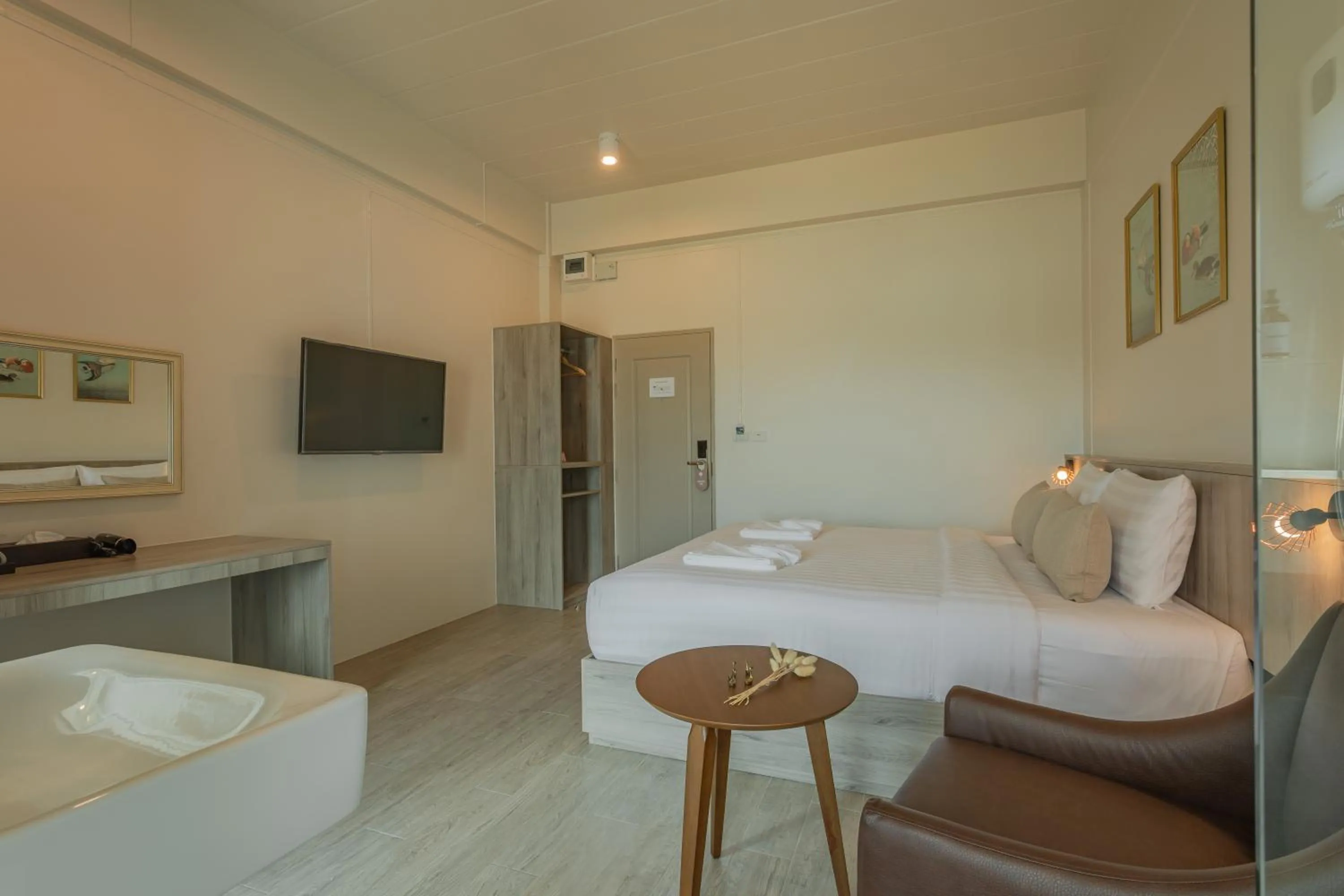 Bed in Ang Pao Hotel Phuket