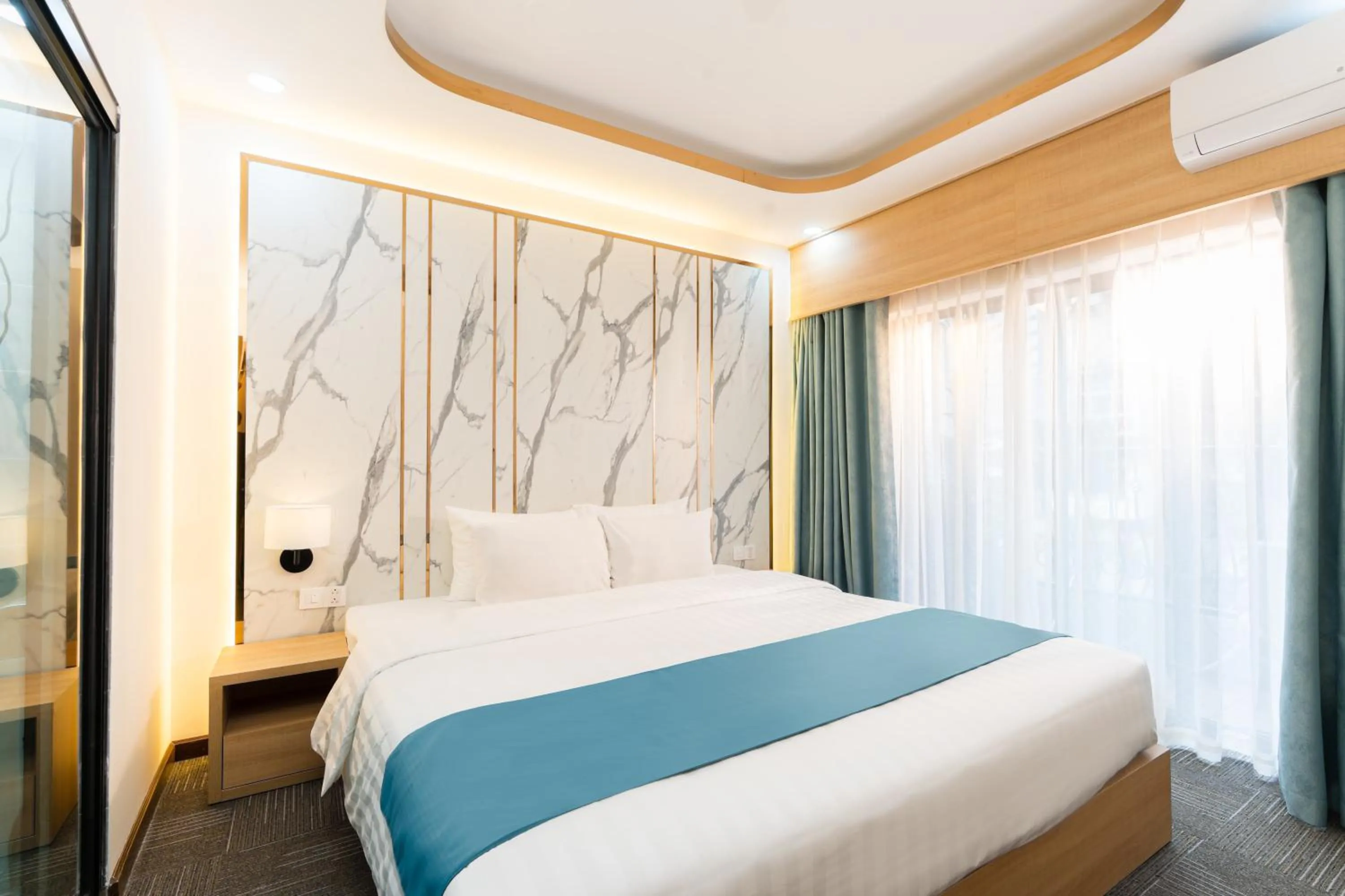 Bed in Capital Garden Hotel