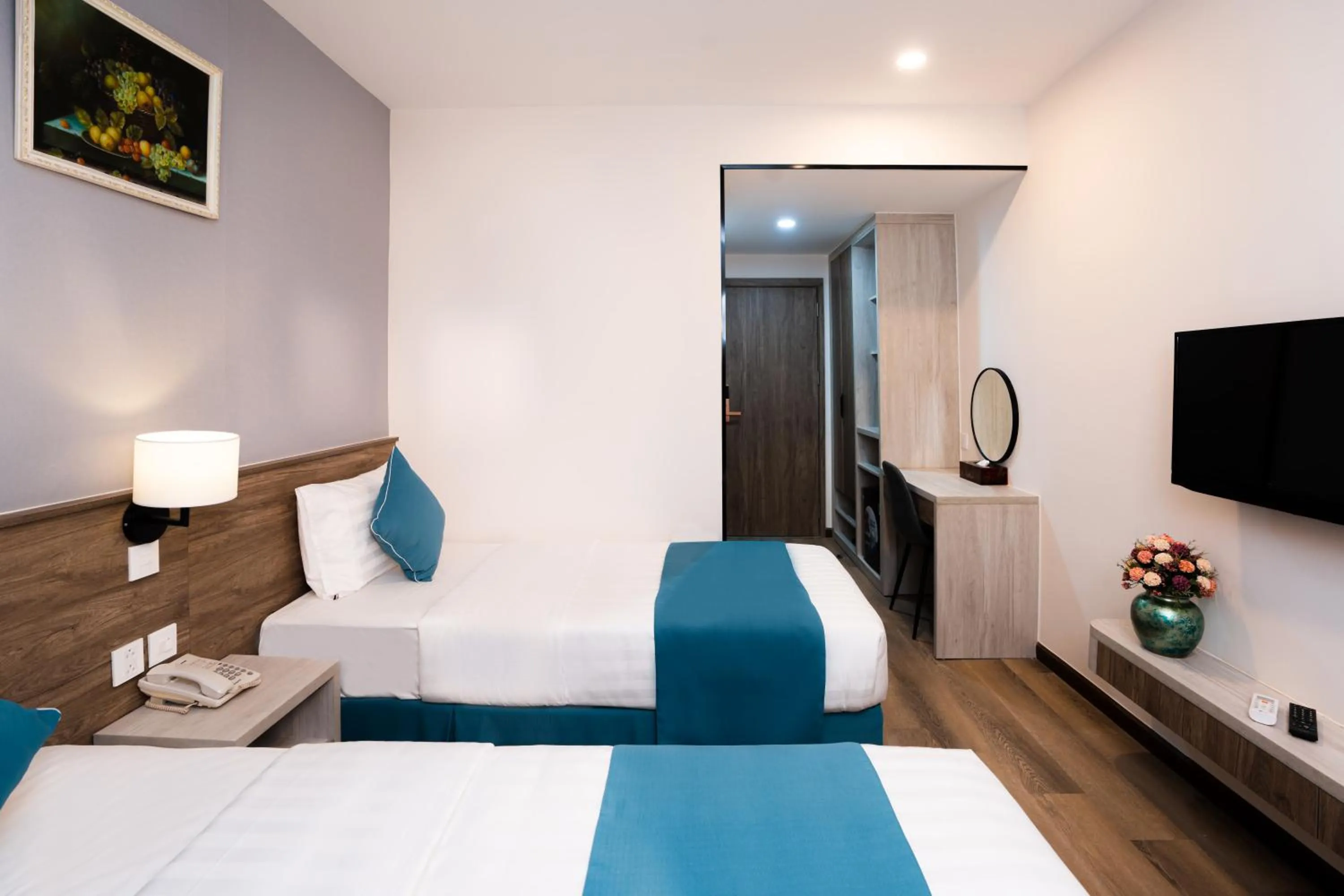 Seating area, Bed in Capital Garden Hotel