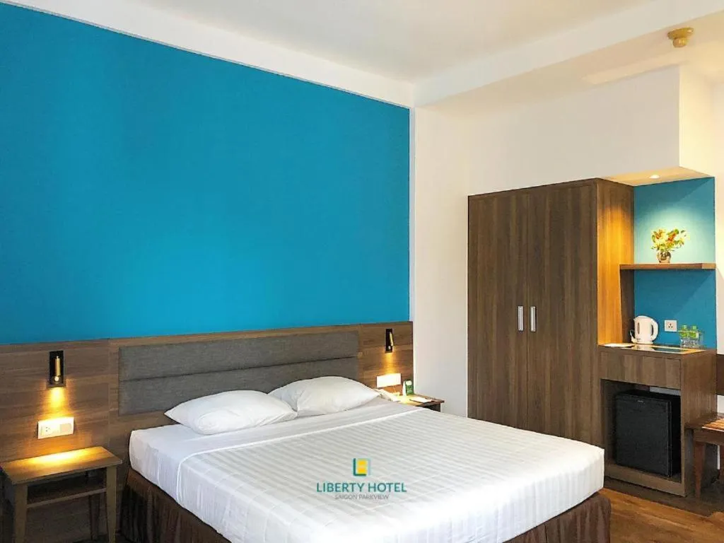 Bed in Liberty Hotel Saigon Parkview