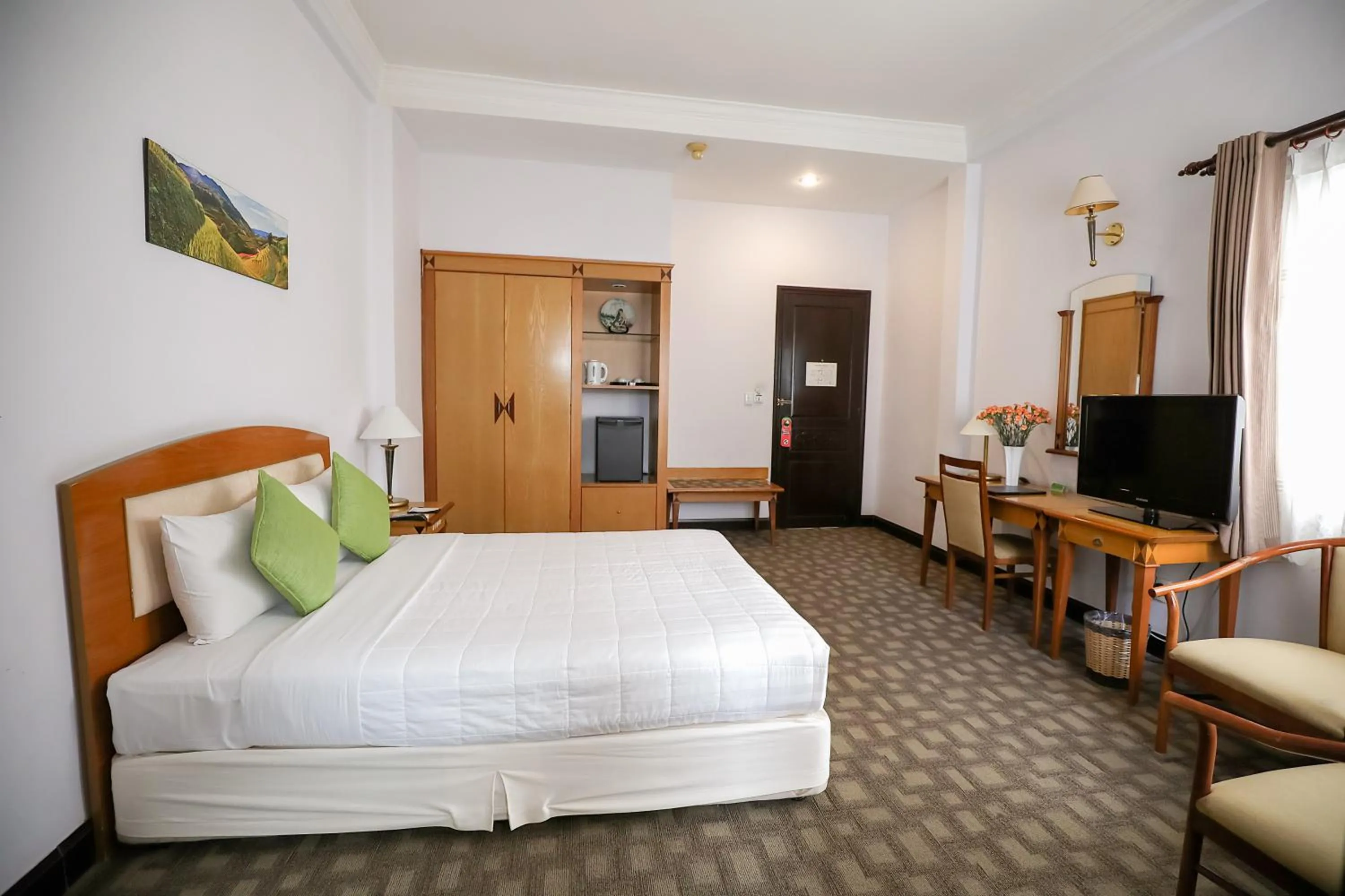 Bed in Liberty Hotel Saigon Parkview