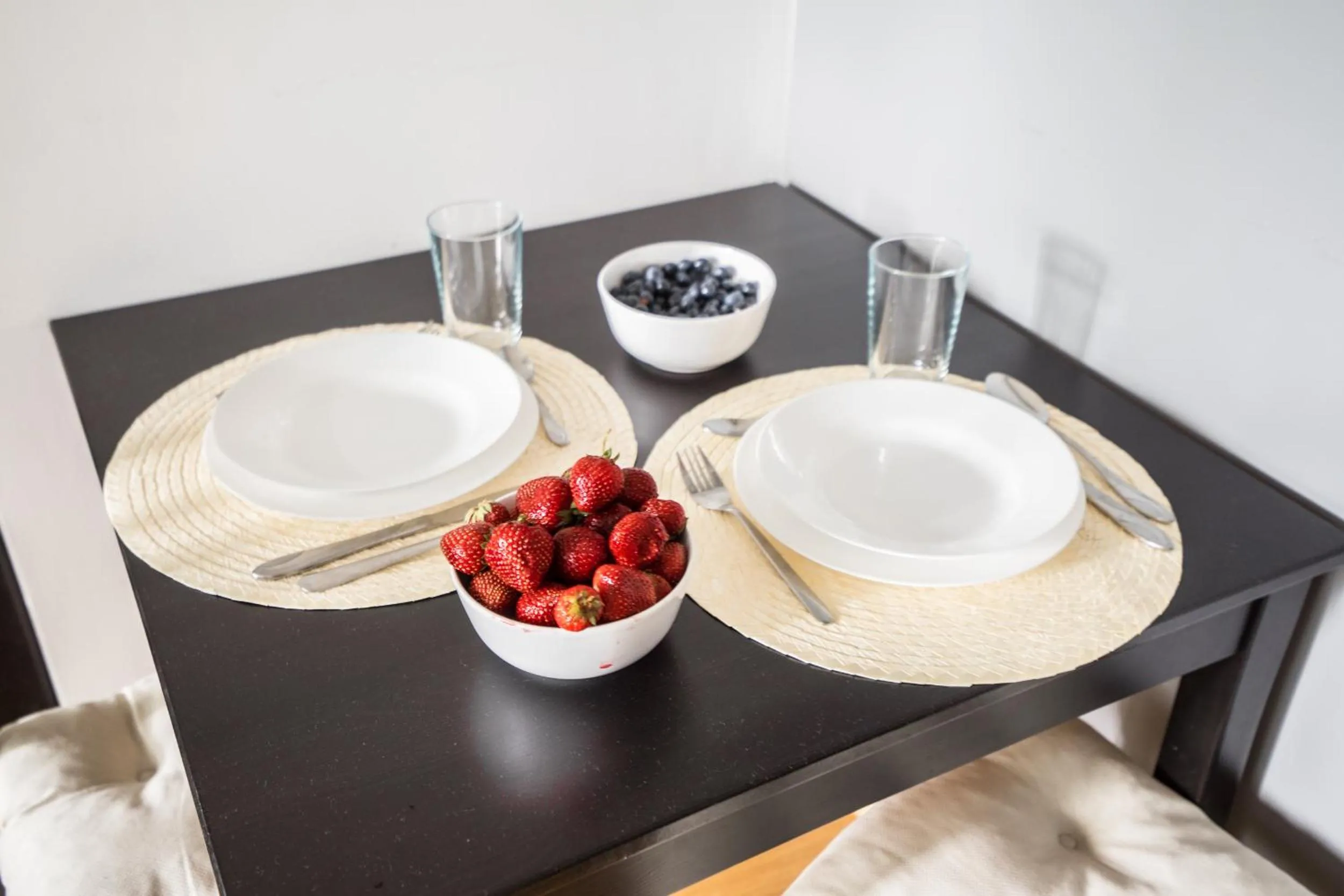 Dining area in oompH Warsaw Central Apartment