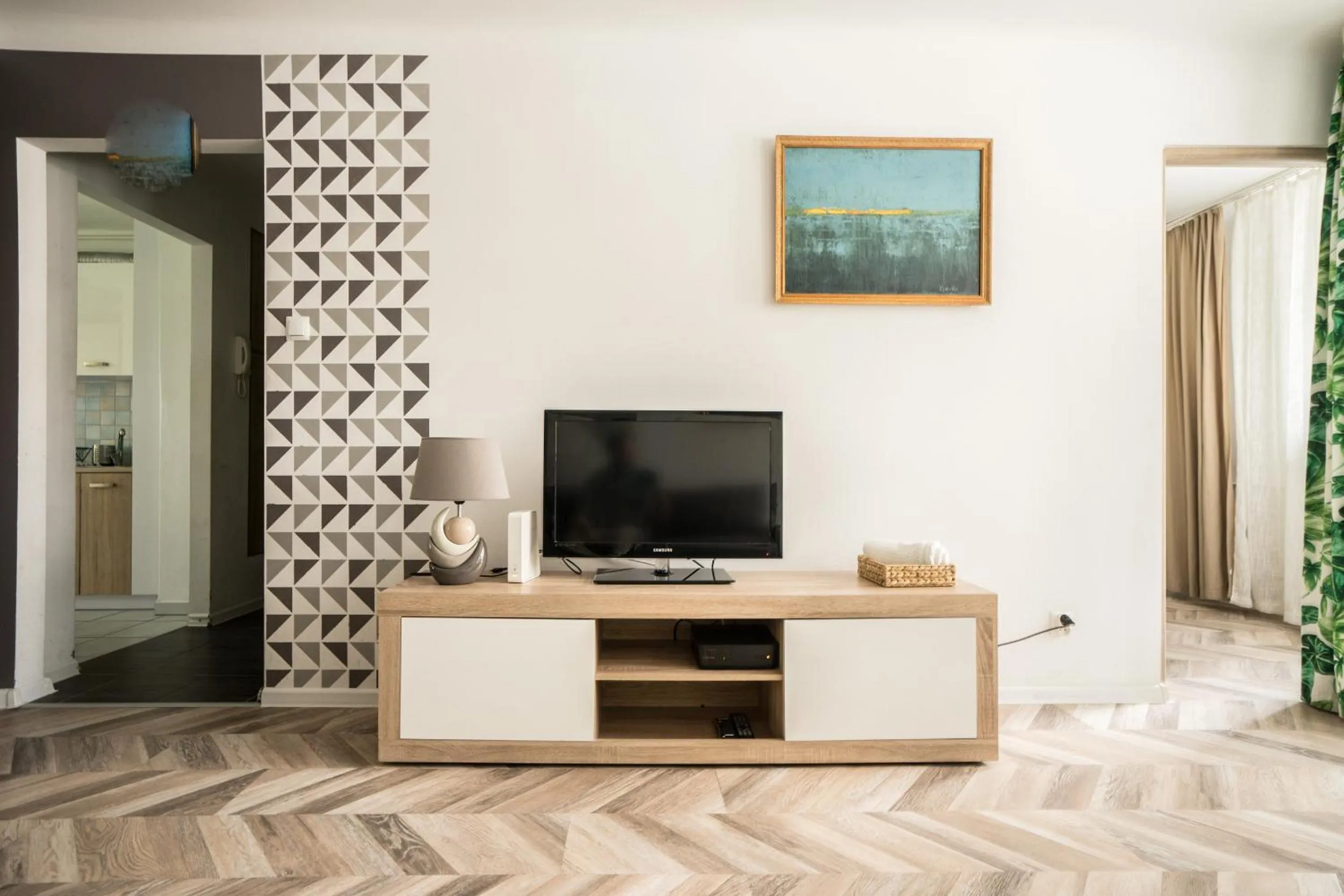 TV and multimedia in oompH Warsaw Central Apartment