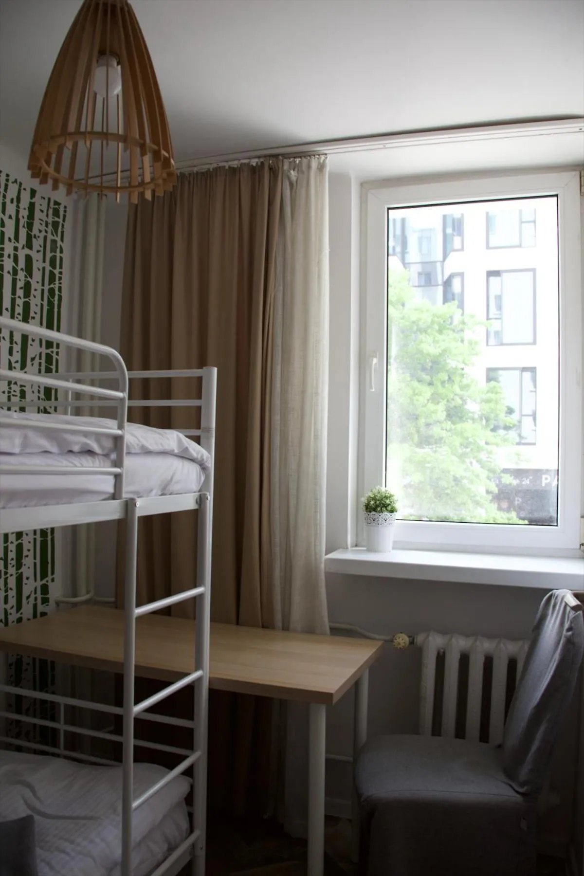 Bed in oompH Warsaw Central Apartment