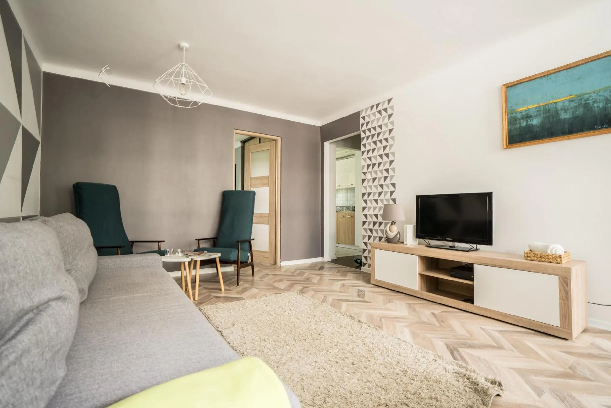 TV and multimedia in oompH Warsaw Central Apartment