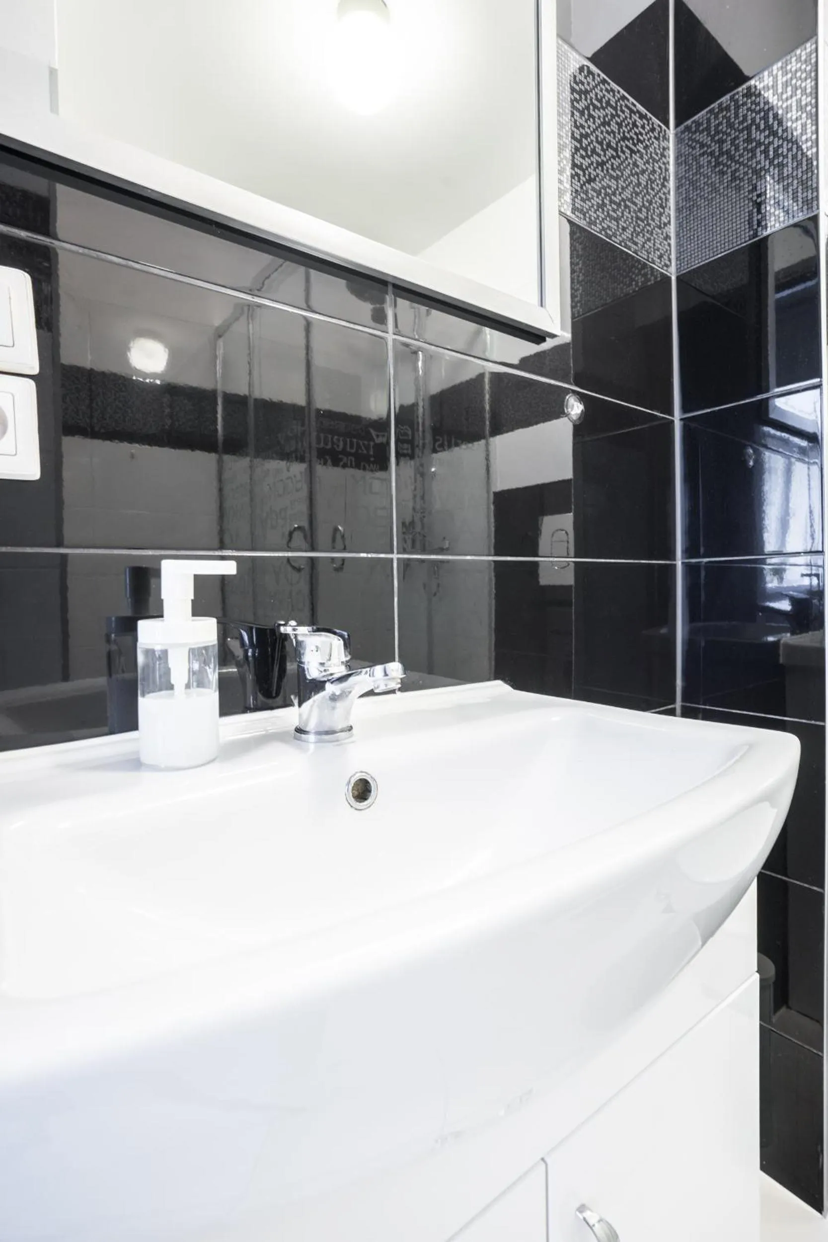 Bathroom in oompH Warsaw Central Apartment