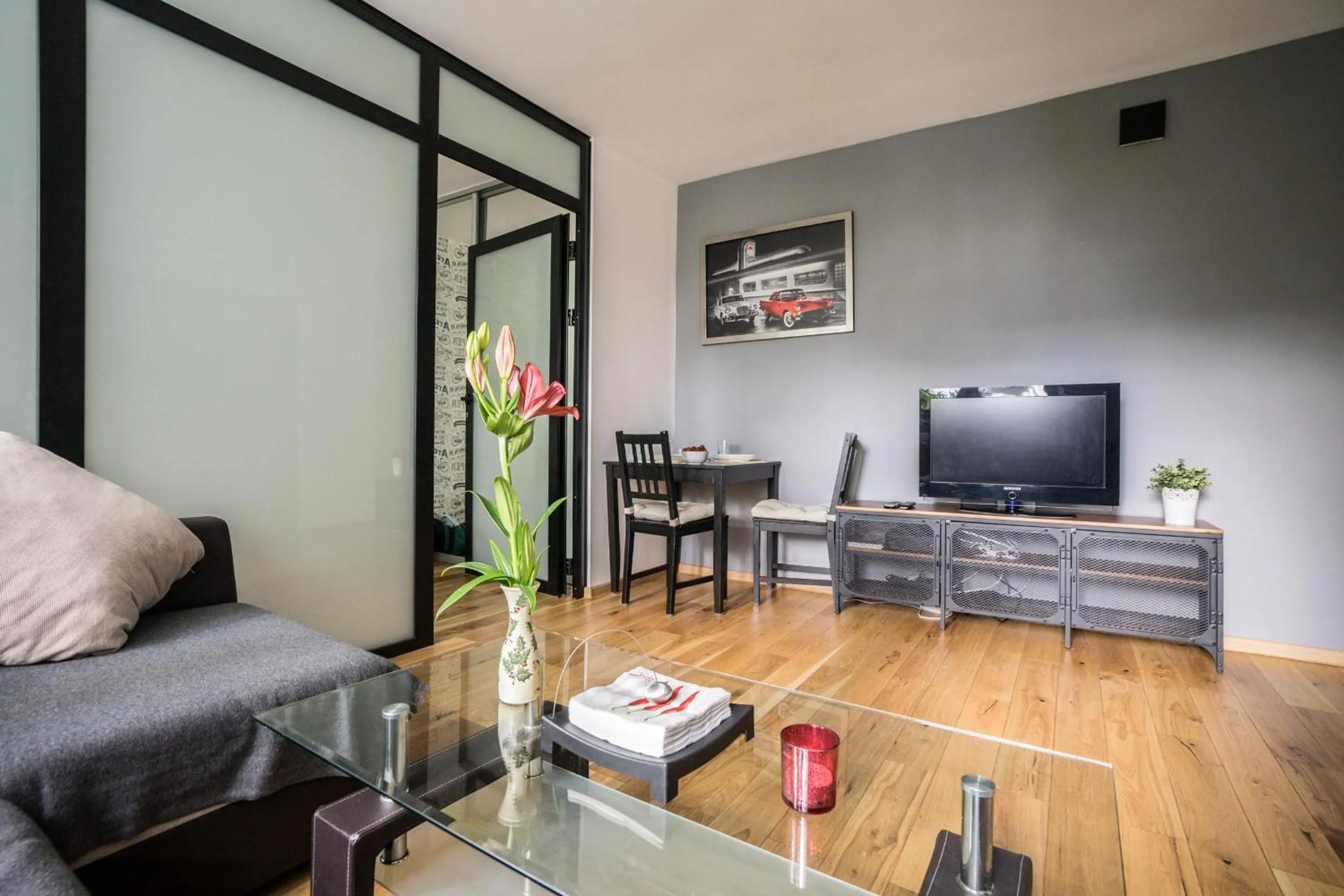 TV and multimedia in oompH Warsaw Central Apartment