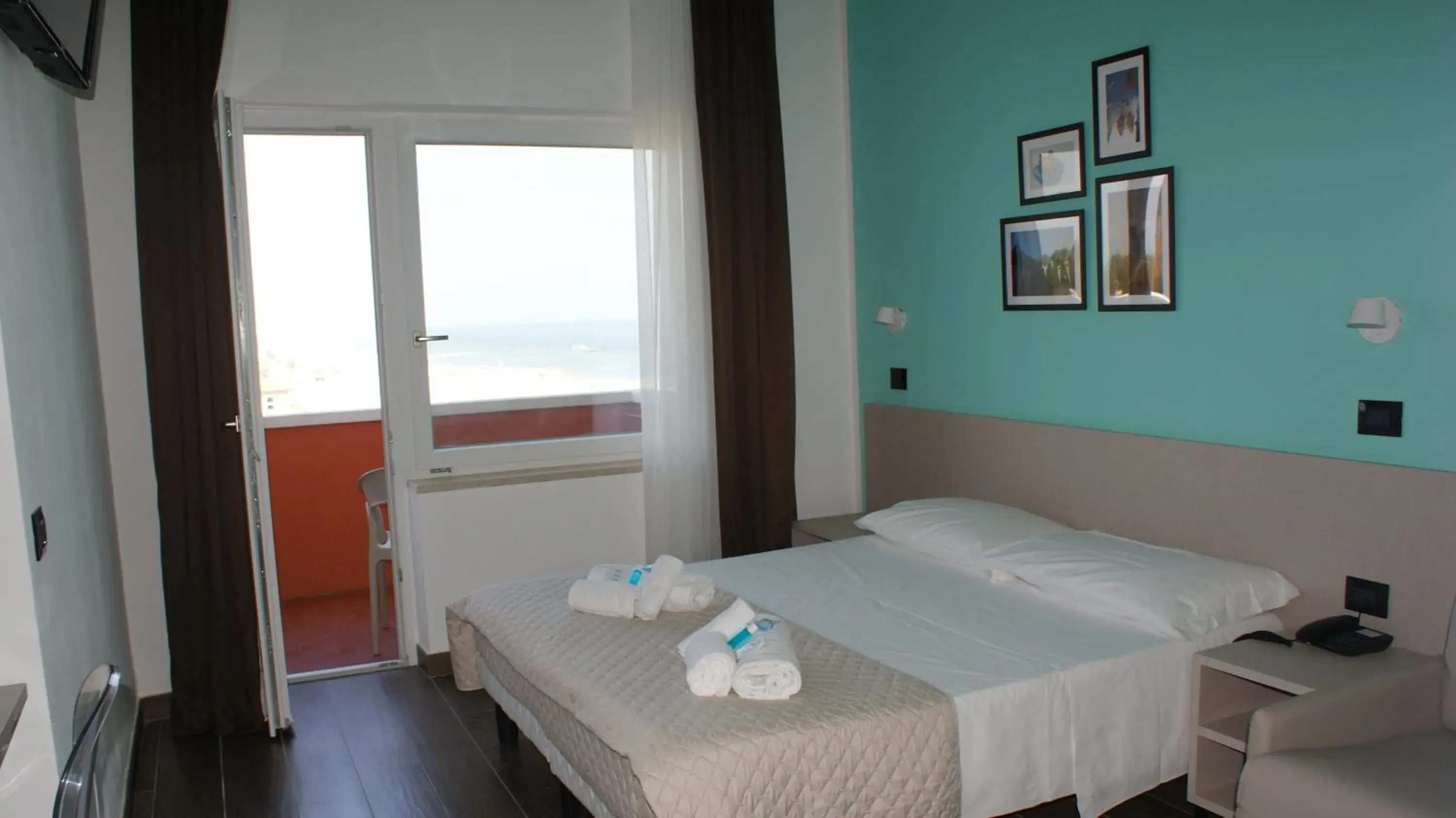 Double or Twin Room with Side Sea View in Hotel Palazzo Caveja Double or Twin Room with Side Sea View in Hotel Palazzo Caveja