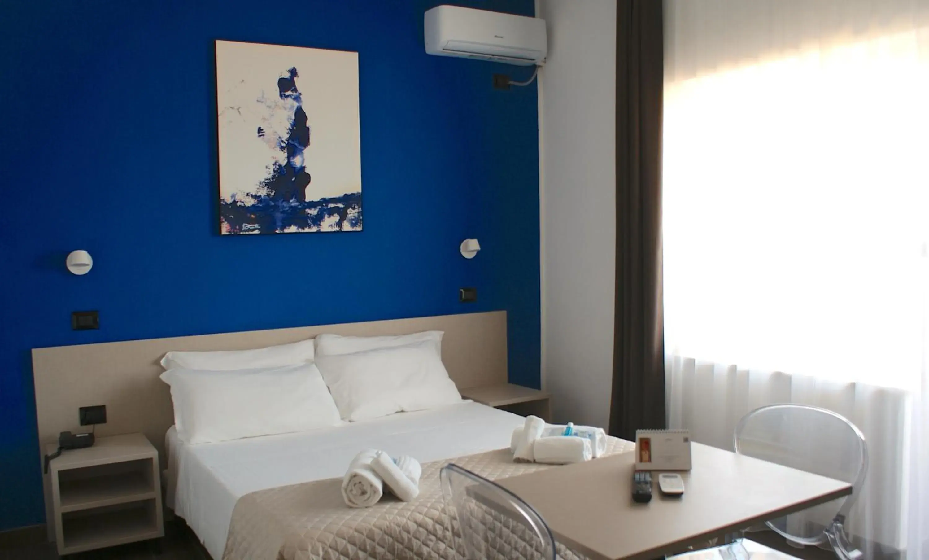 Double or Twin Room with Side Sea View in Hotel Palazzo Caveja Double or Twin Room with Side Sea View in Hotel Palazzo Caveja
