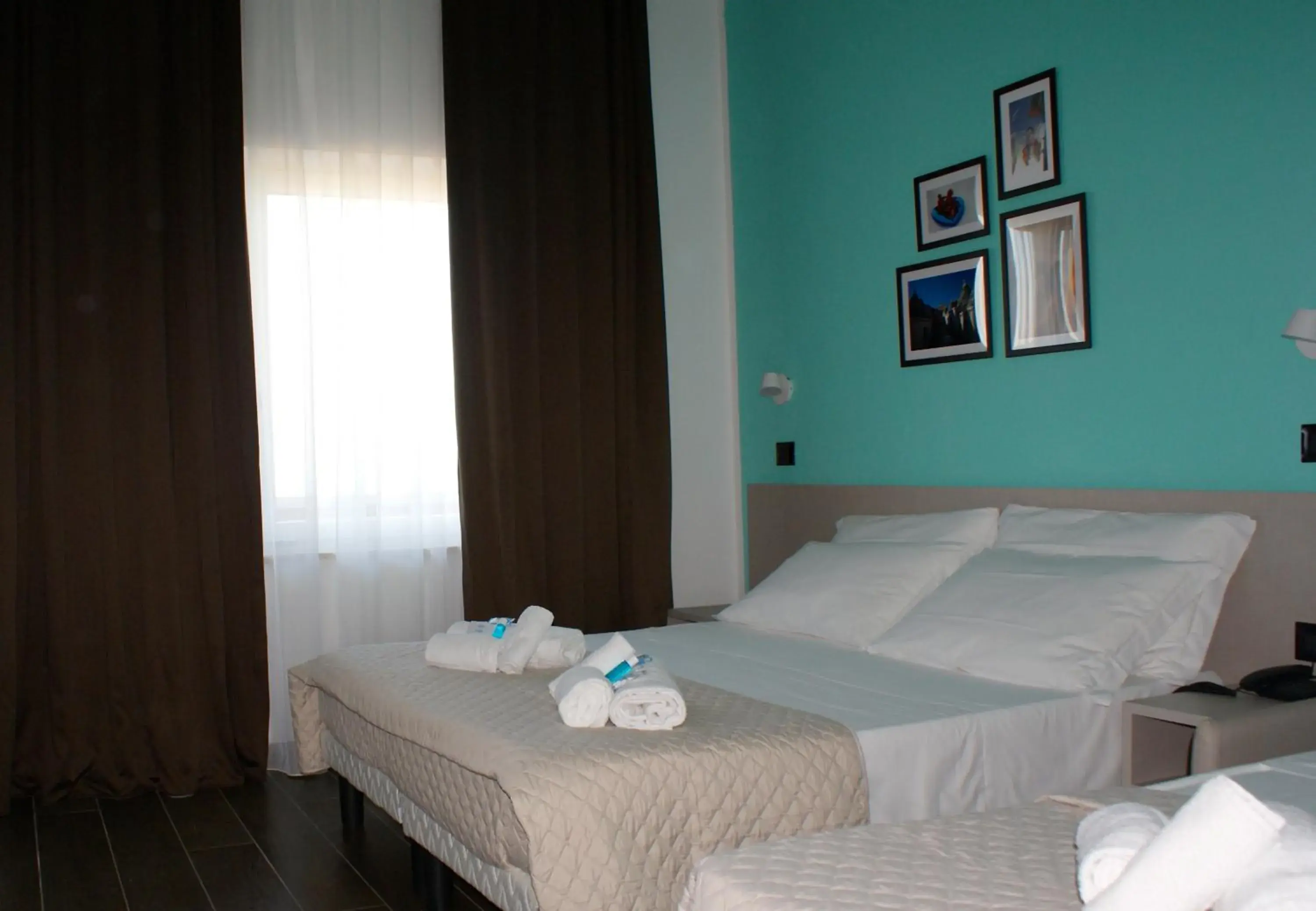 Triple Room in Hotel Palazzo Caveja Triple Room in Hotel Palazzo Caveja
