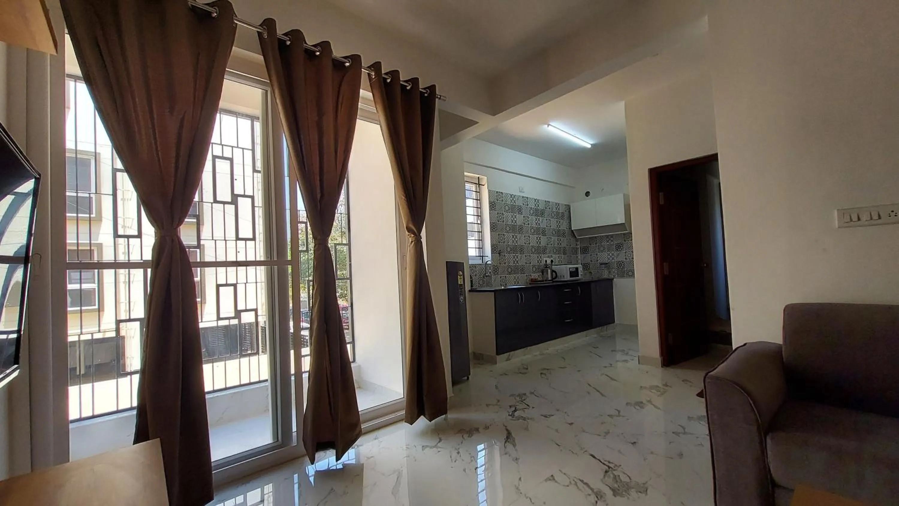 Living room in Tranquil Serviced Apartments - HSR Layout