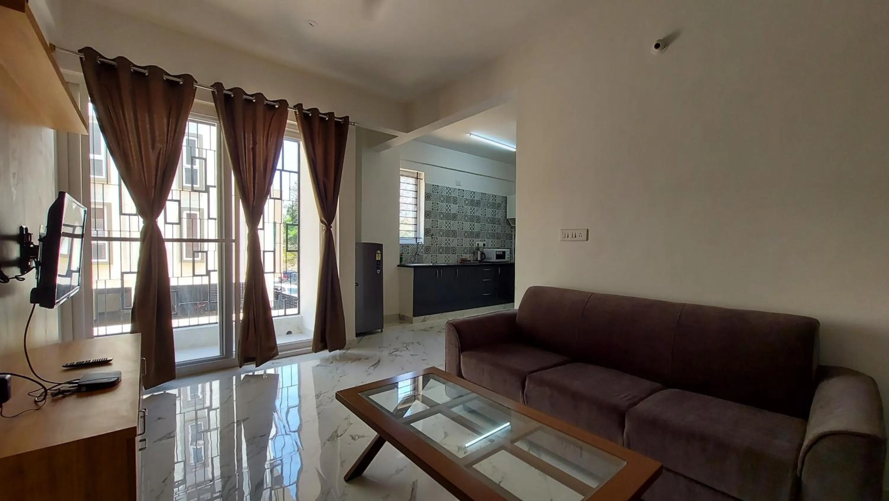 TV and multimedia in Tranquil Serviced Apartments - HSR Layout