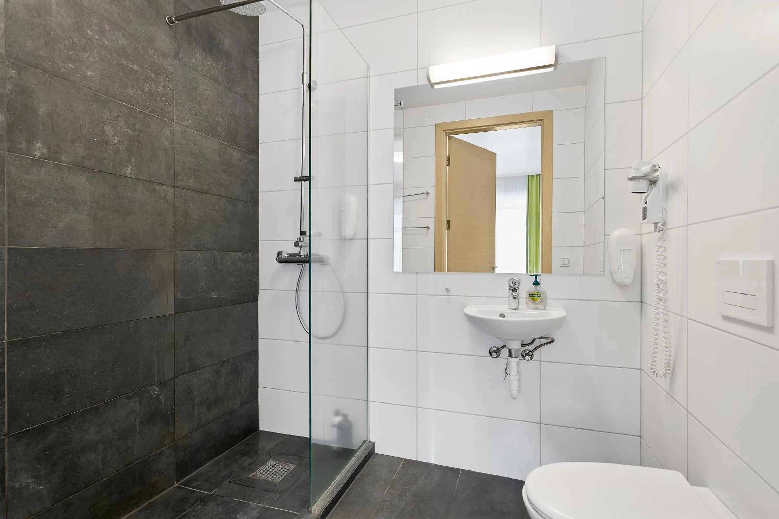 Shower in Iceland Comfort Apartments by Heimaleiga