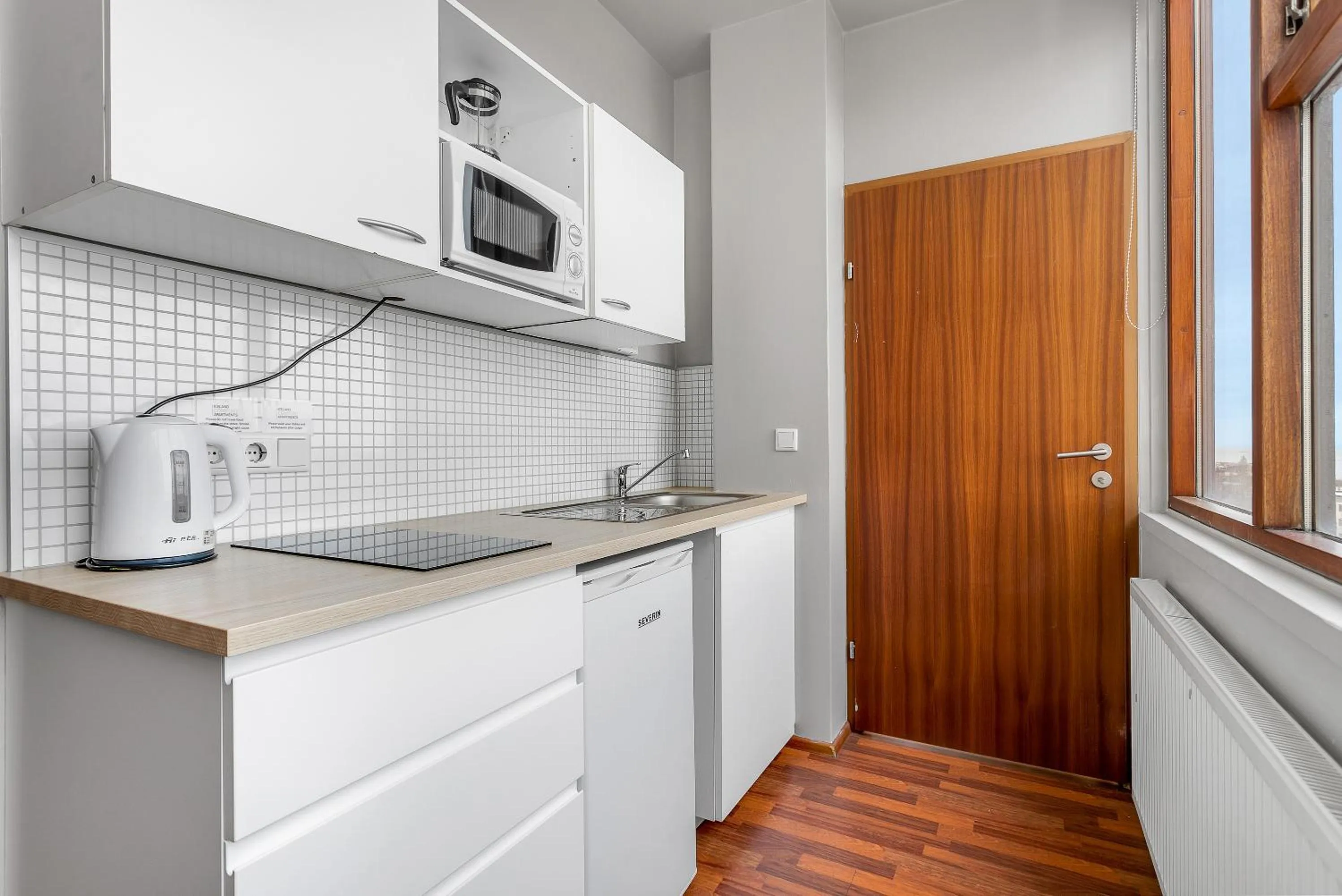 Kitchen or kitchenette in Iceland Comfort Apartments by Heimaleiga