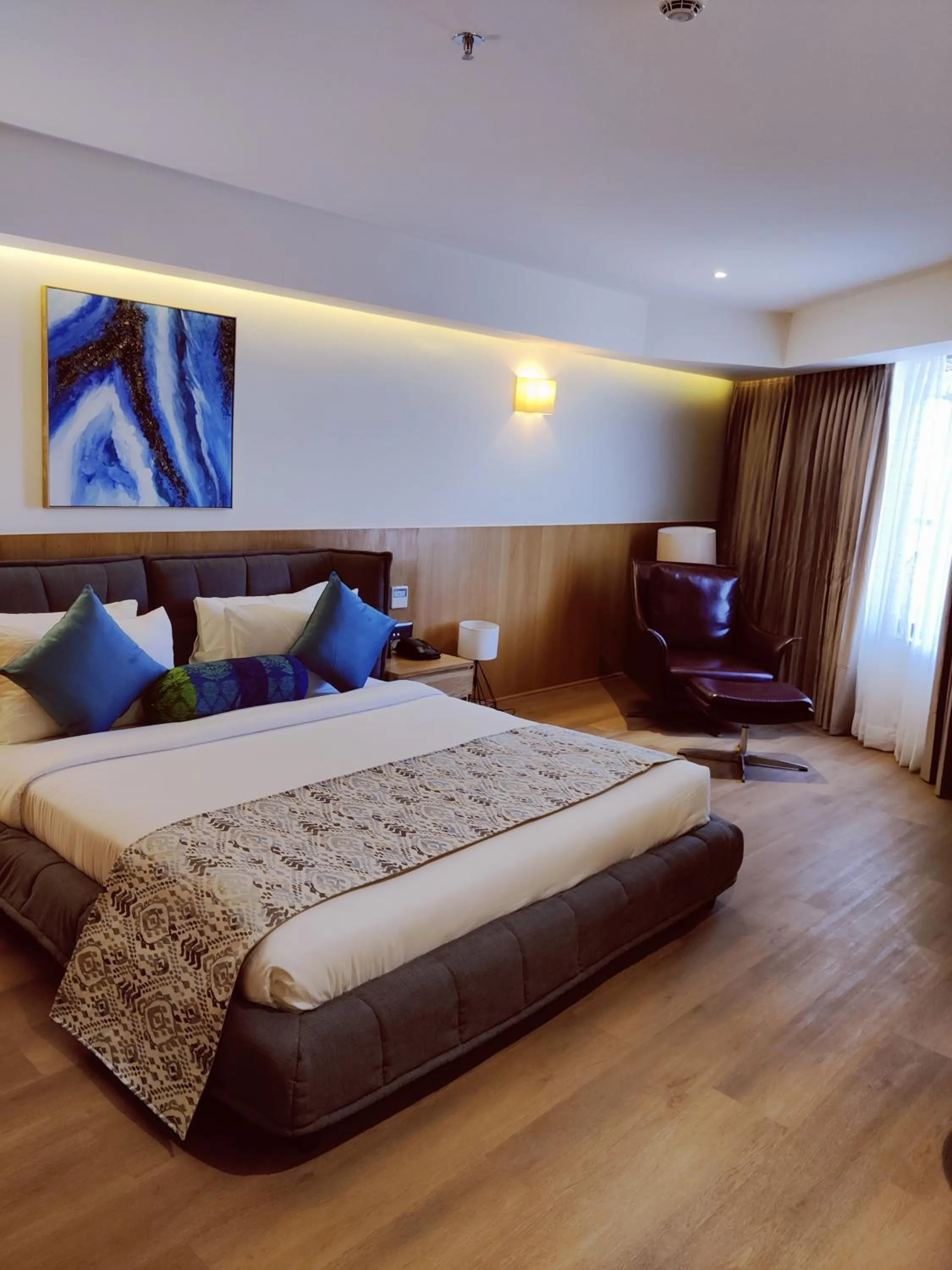 Bed in The Fern Residency, Jamnagar