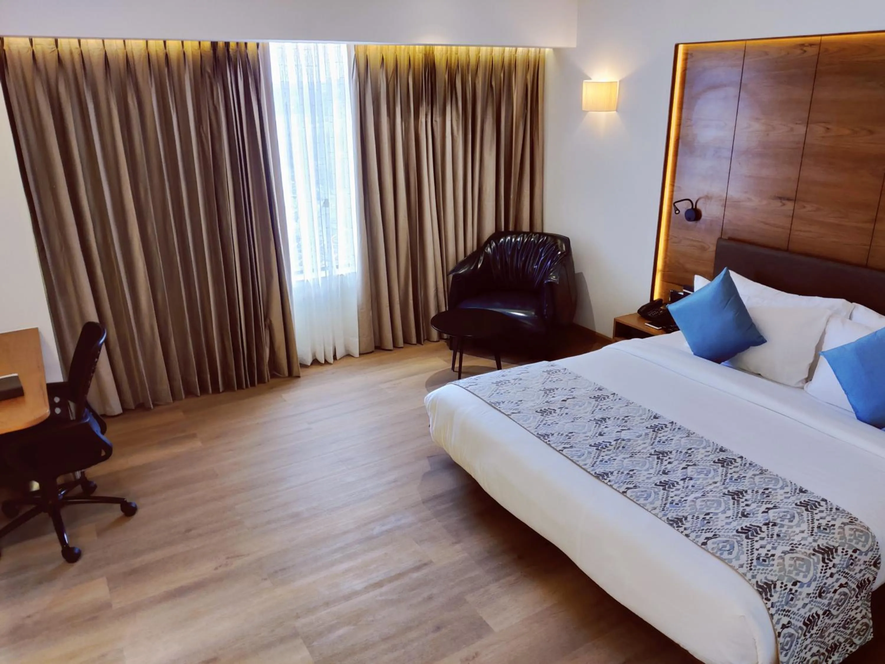 Bed in The Fern Residency, Jamnagar