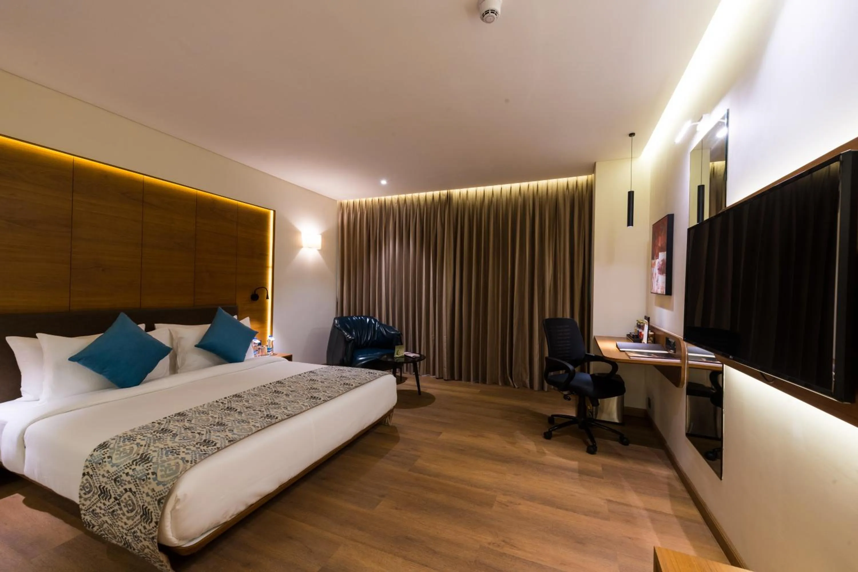 Bed in The Fern Residency, Jamnagar