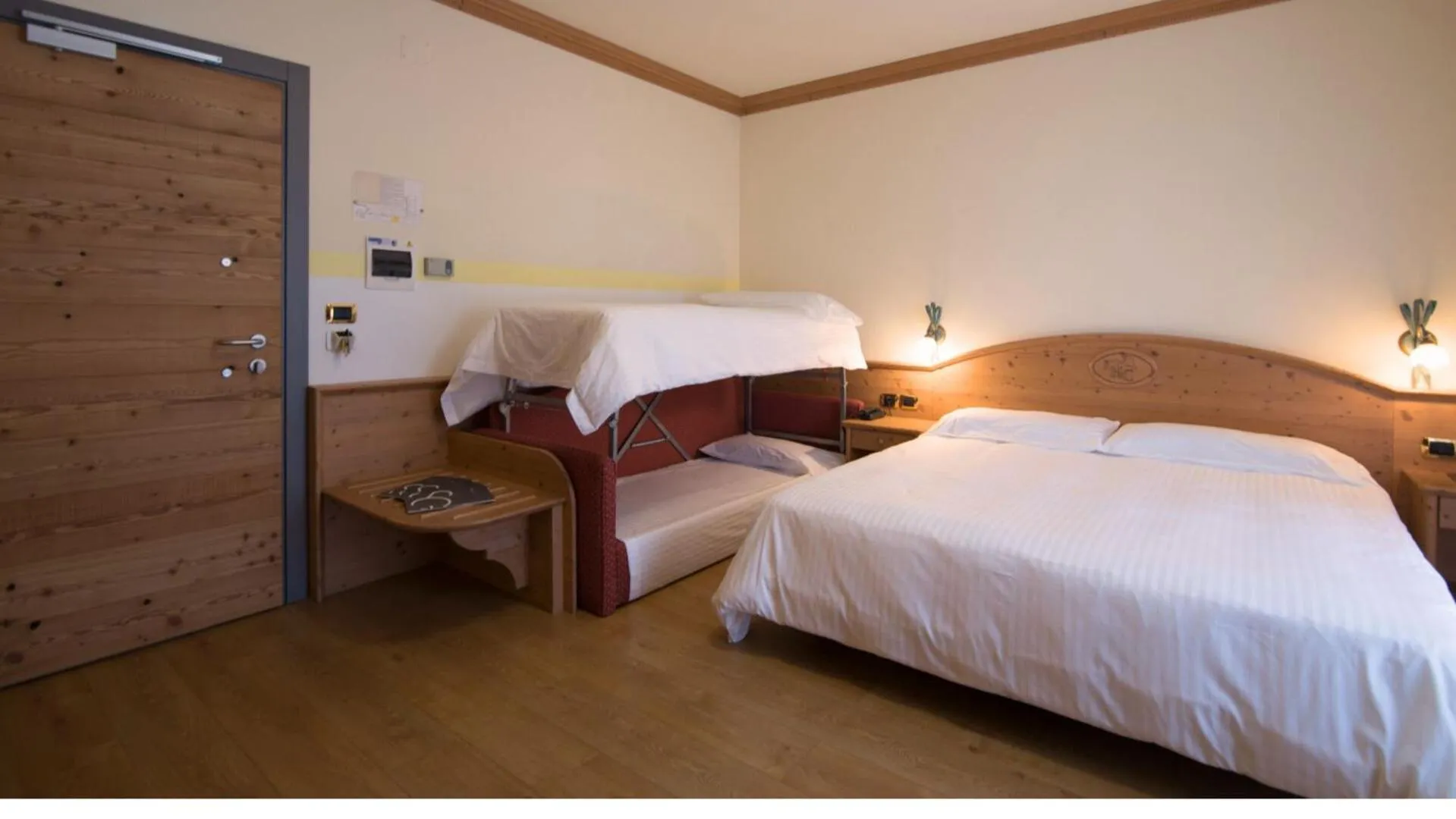 Bed in Hotel Colfosco