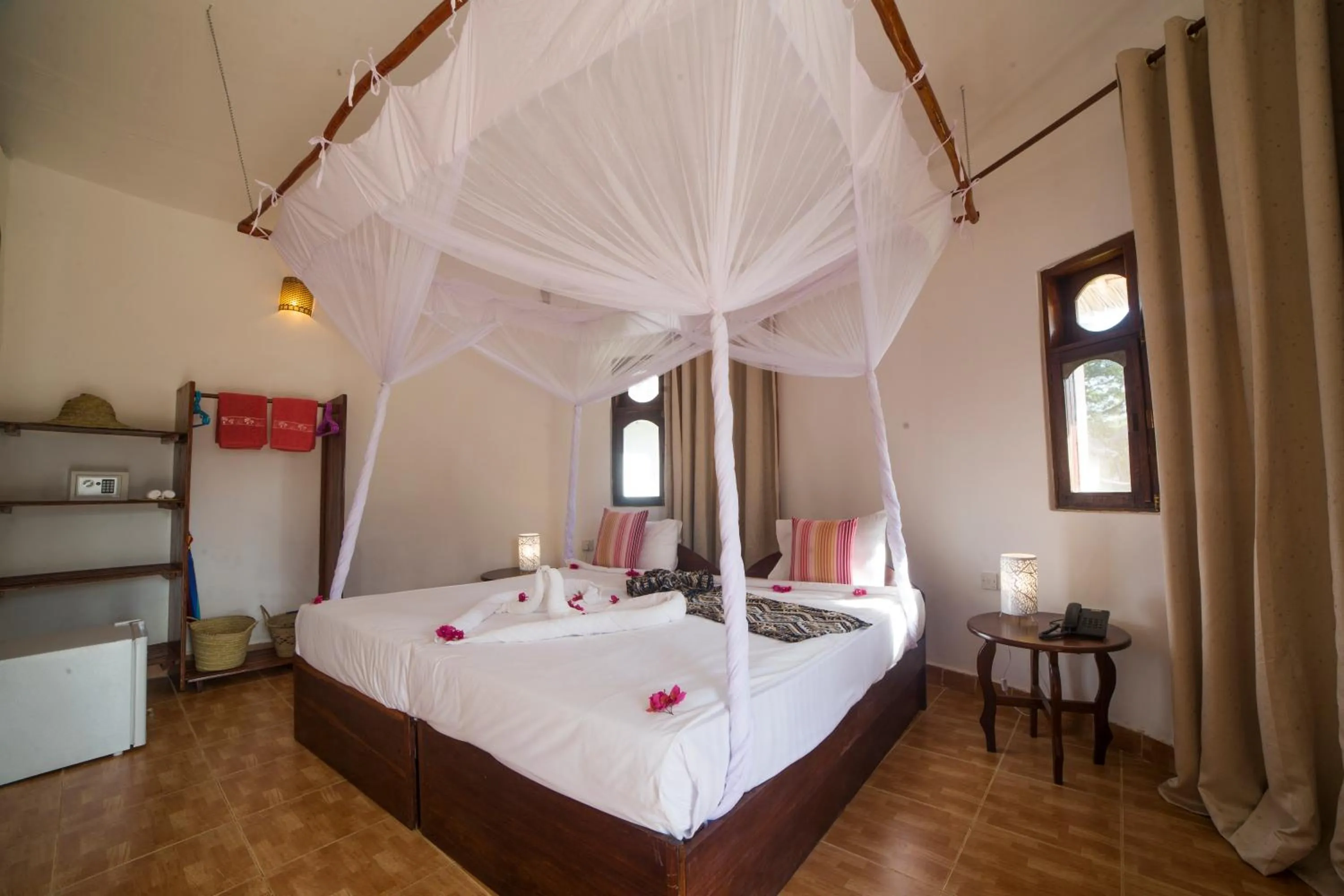 Bed in Antonio Beach Tree House Hotel & Spa
