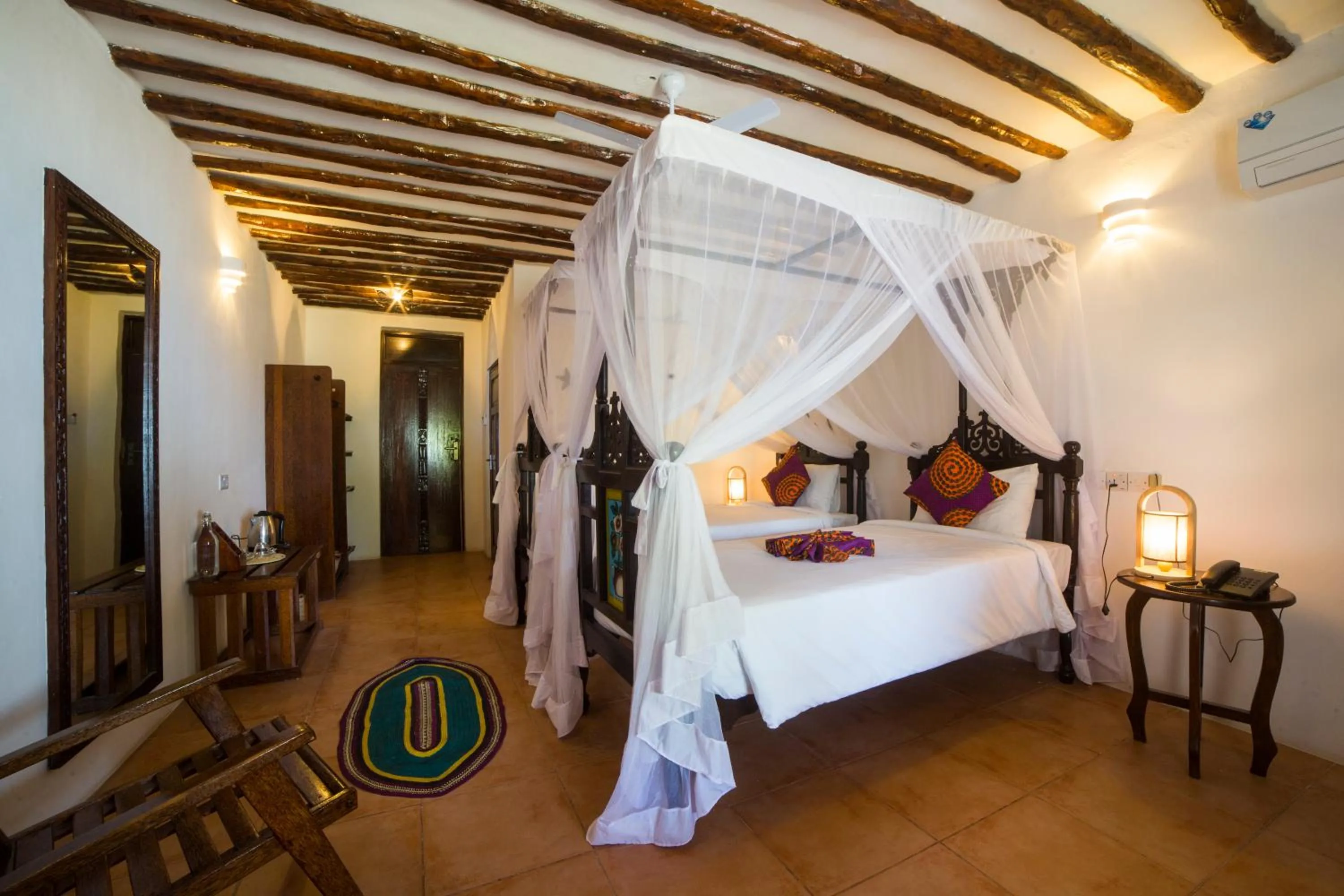 Bed in Antonio Beach Tree House Hotel & Spa