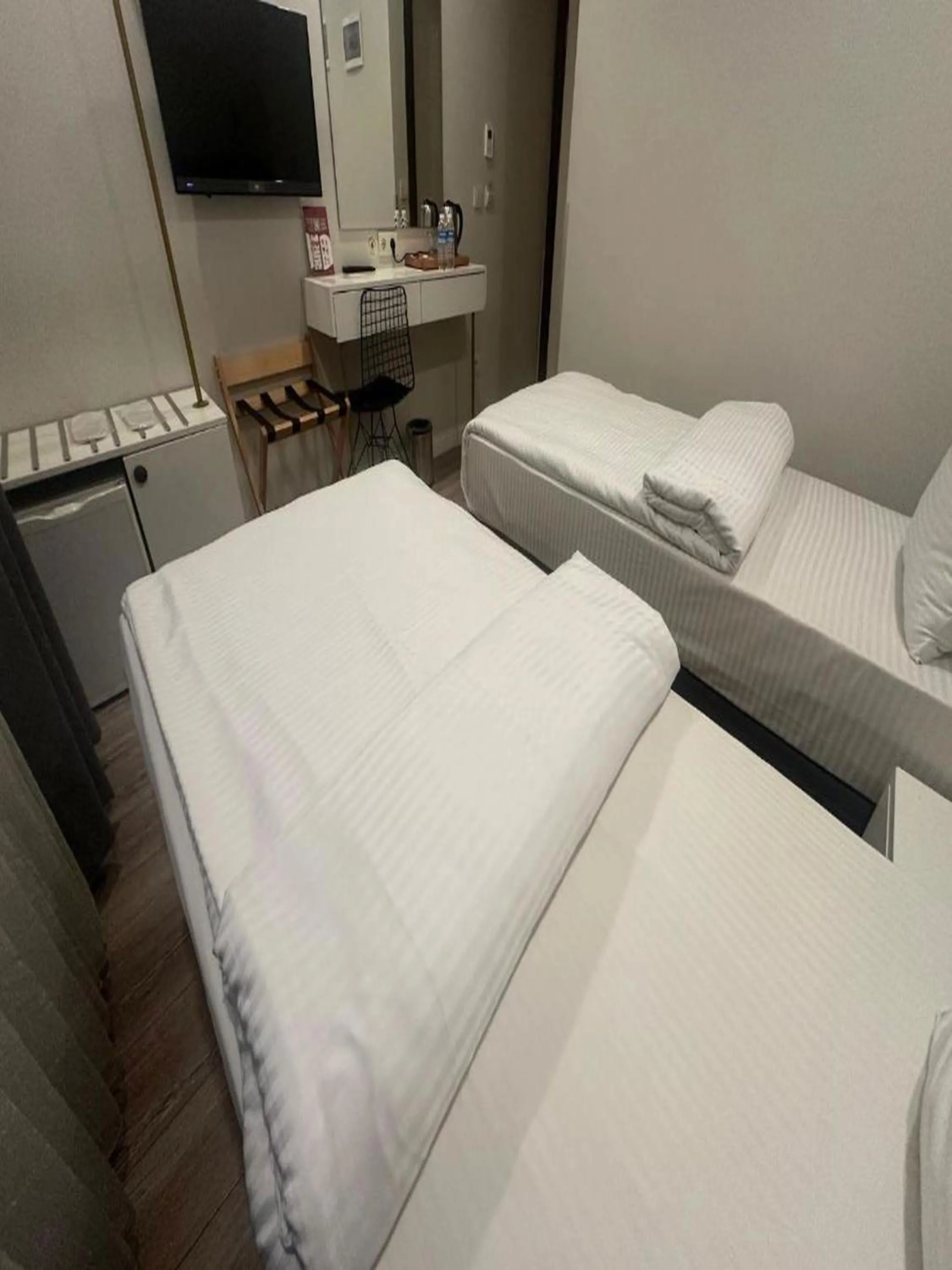 Bed in Actuel Life Hotel