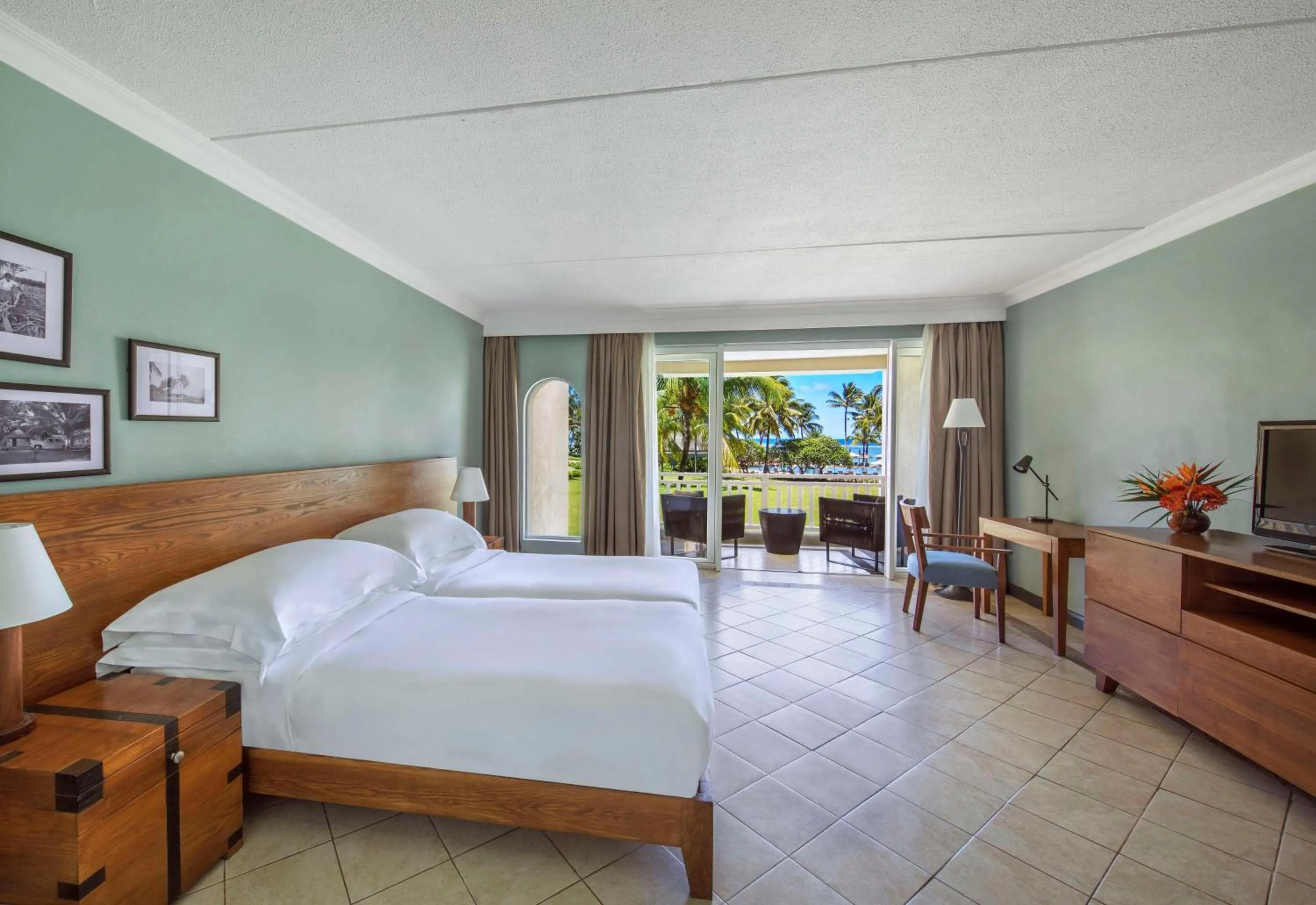 Bedroom, Bed in Outrigger Mauritius Beach Resort