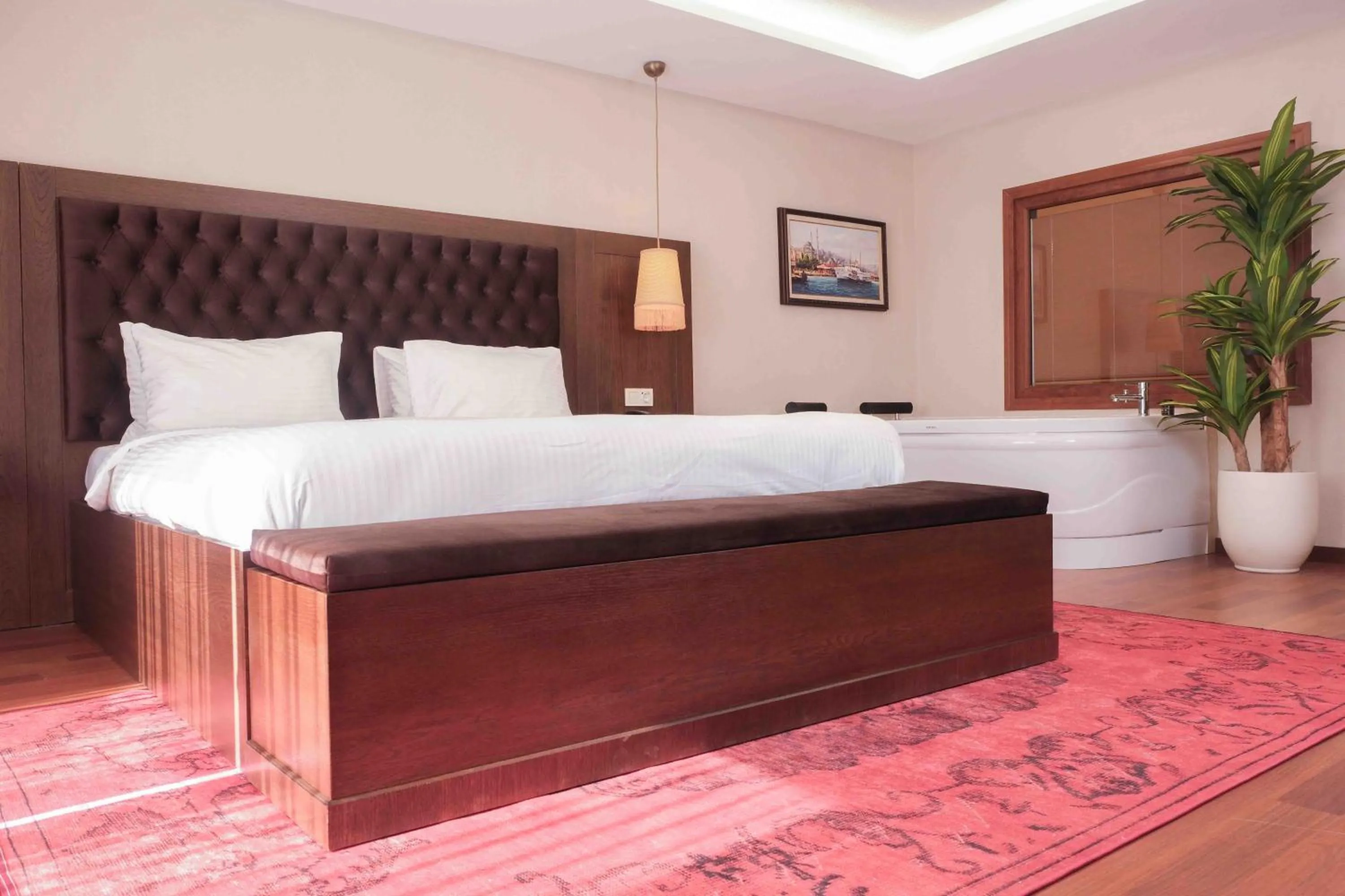 Bed in Phellos Suites Boutique Hotel