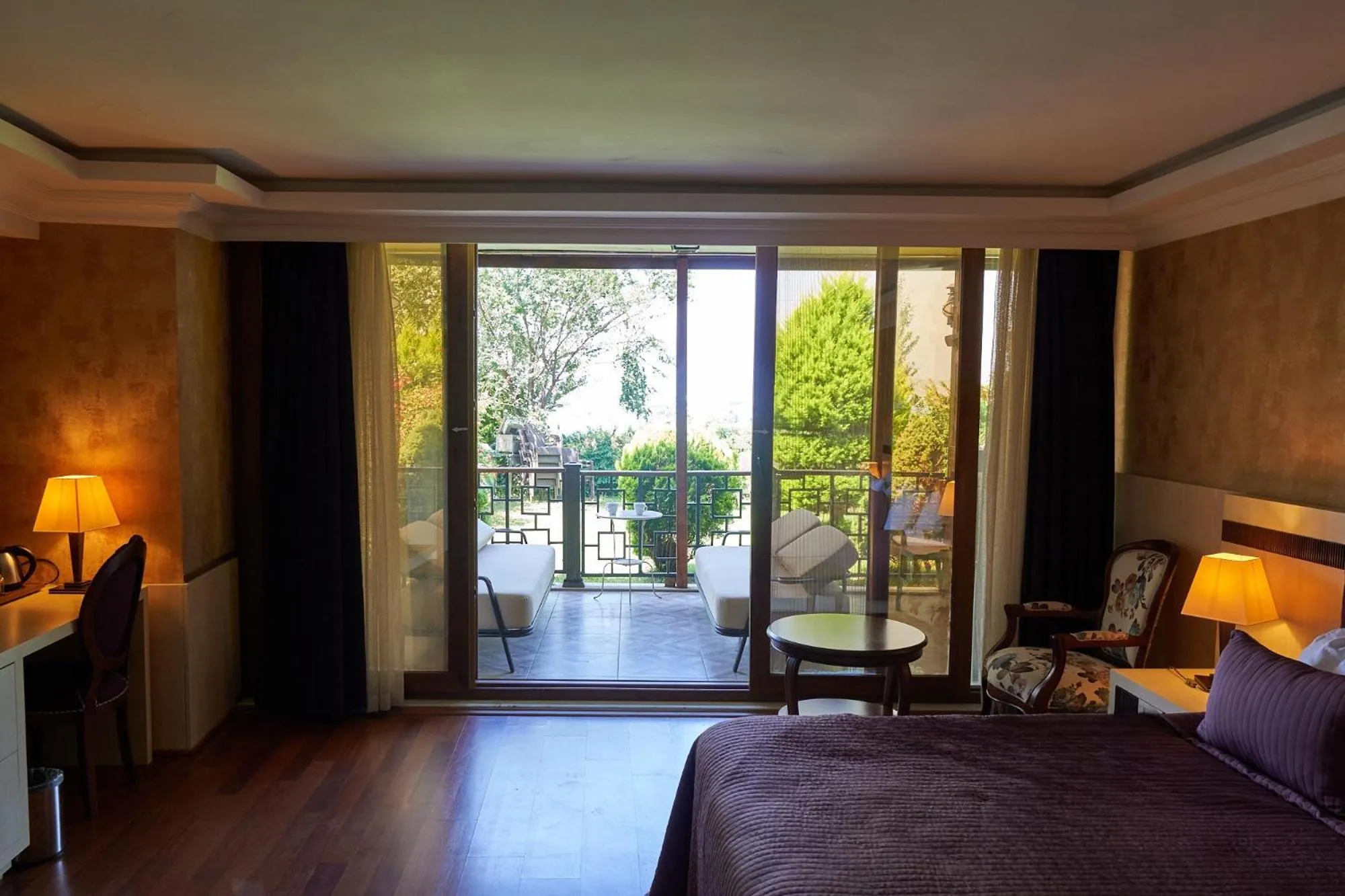 Bed in Phellos Suites Boutique Hotel