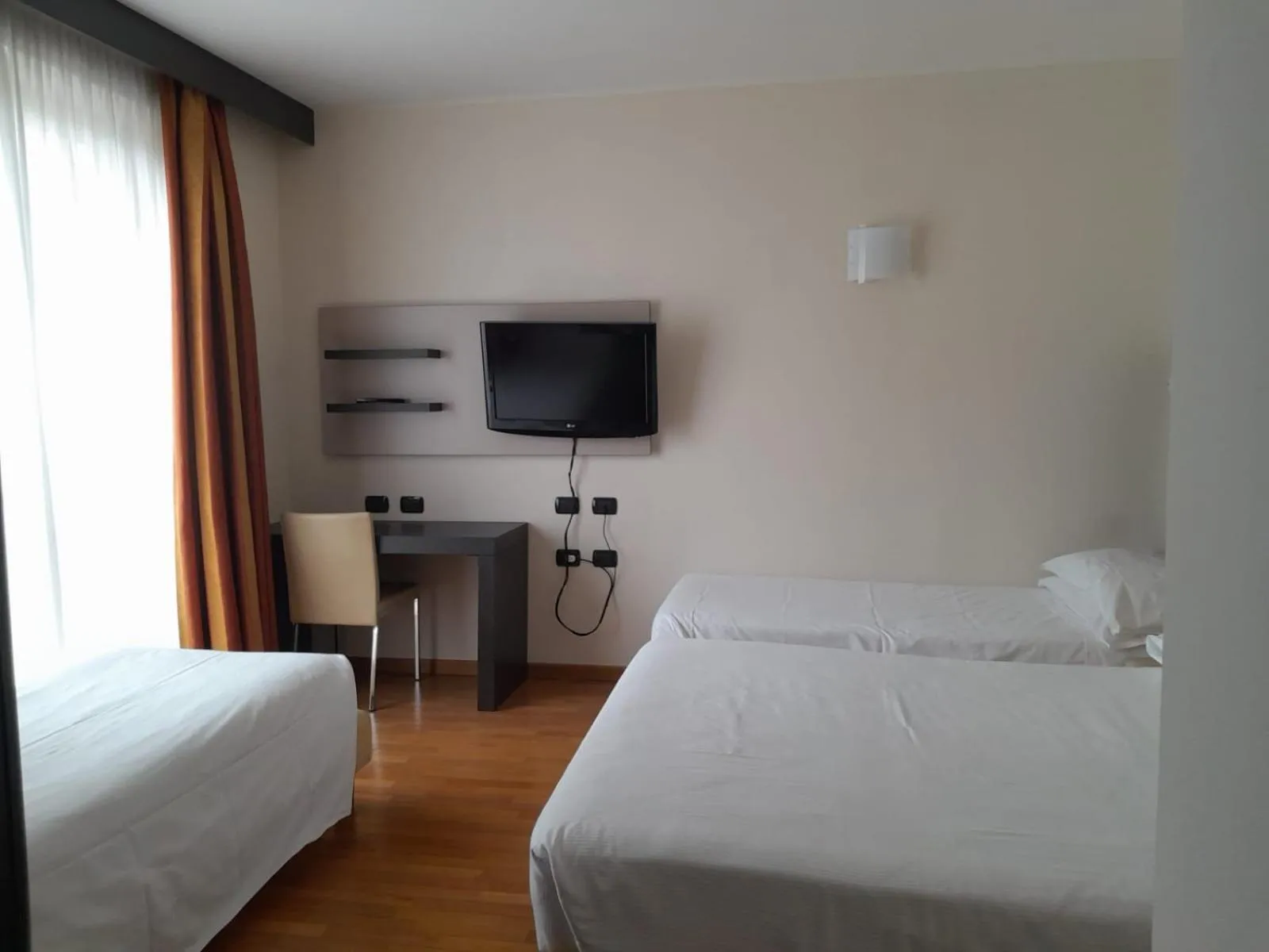 Bed in Elysium Hotel Raya