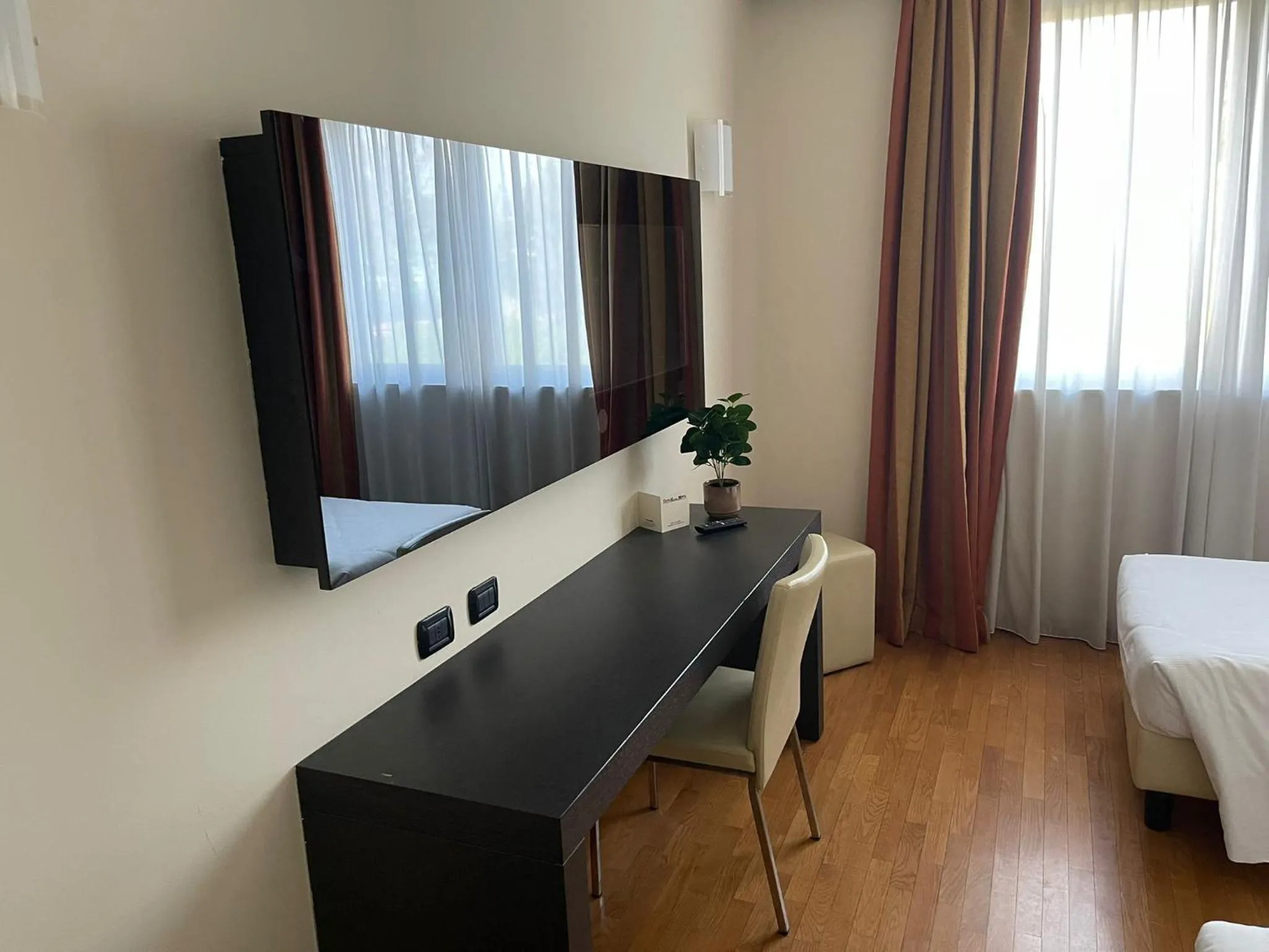 Bed in Elysium Hotel Raya