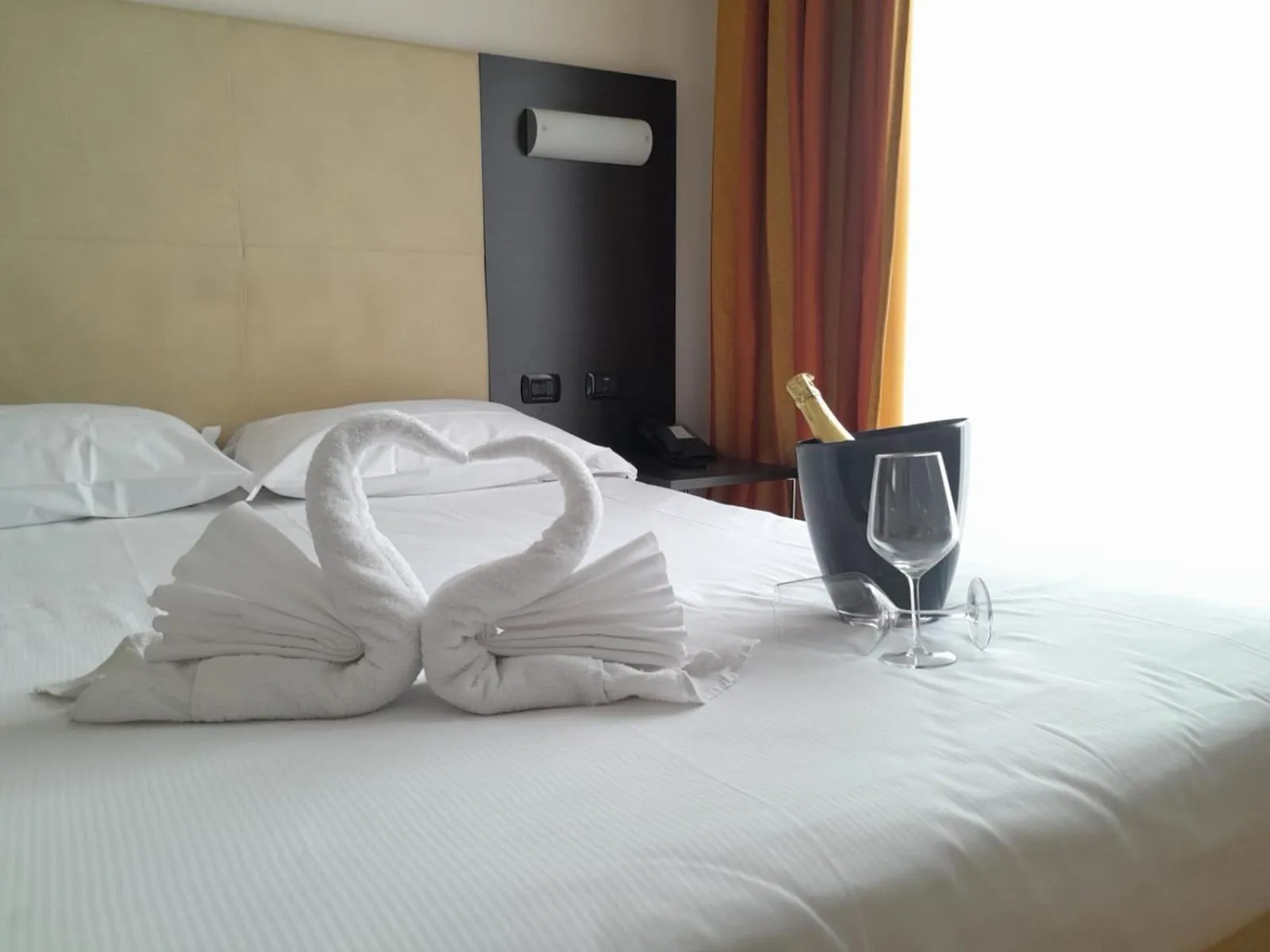 Bed in Elysium Hotel Raya