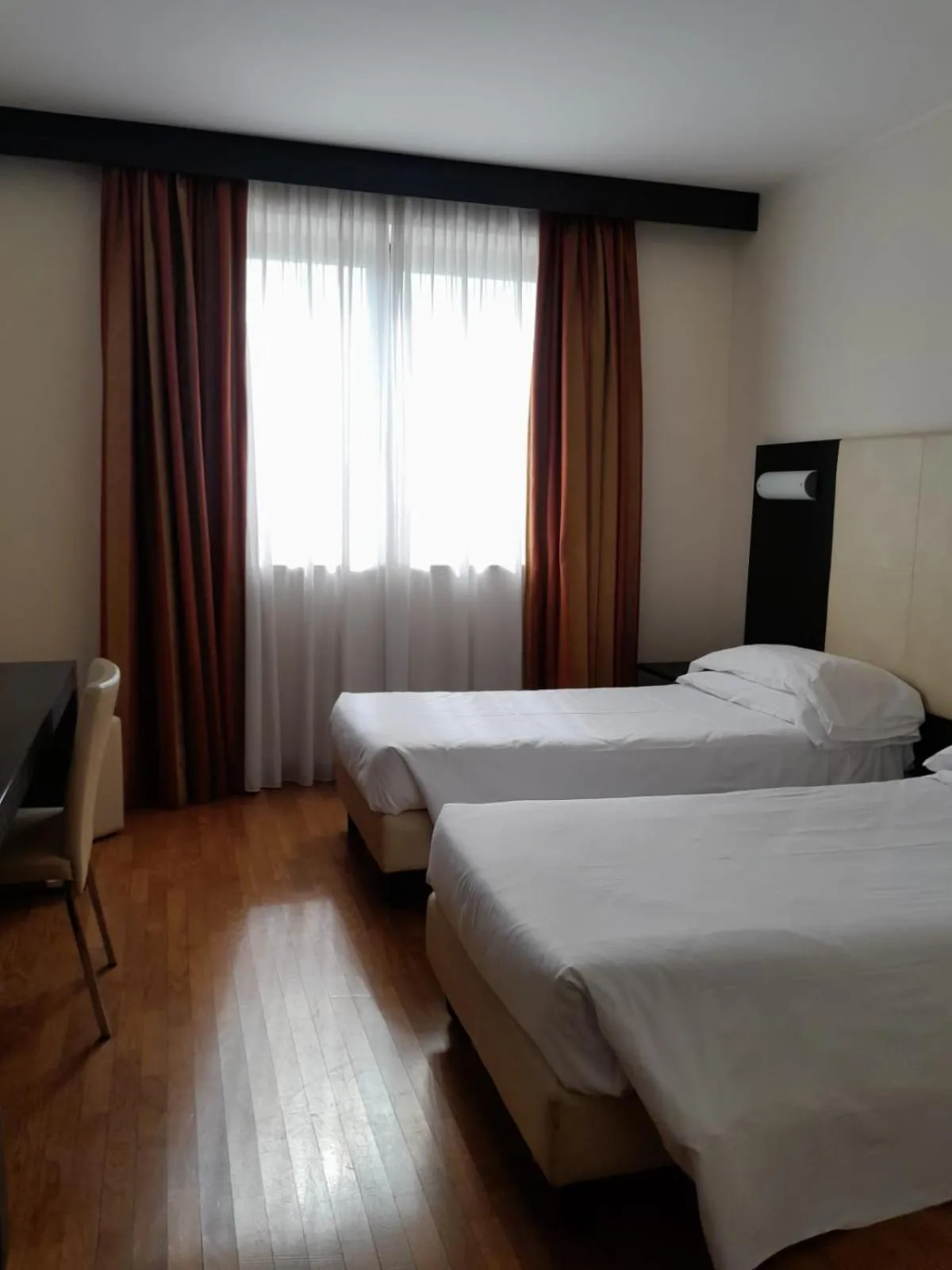 Bed in Elysium Hotel Raya